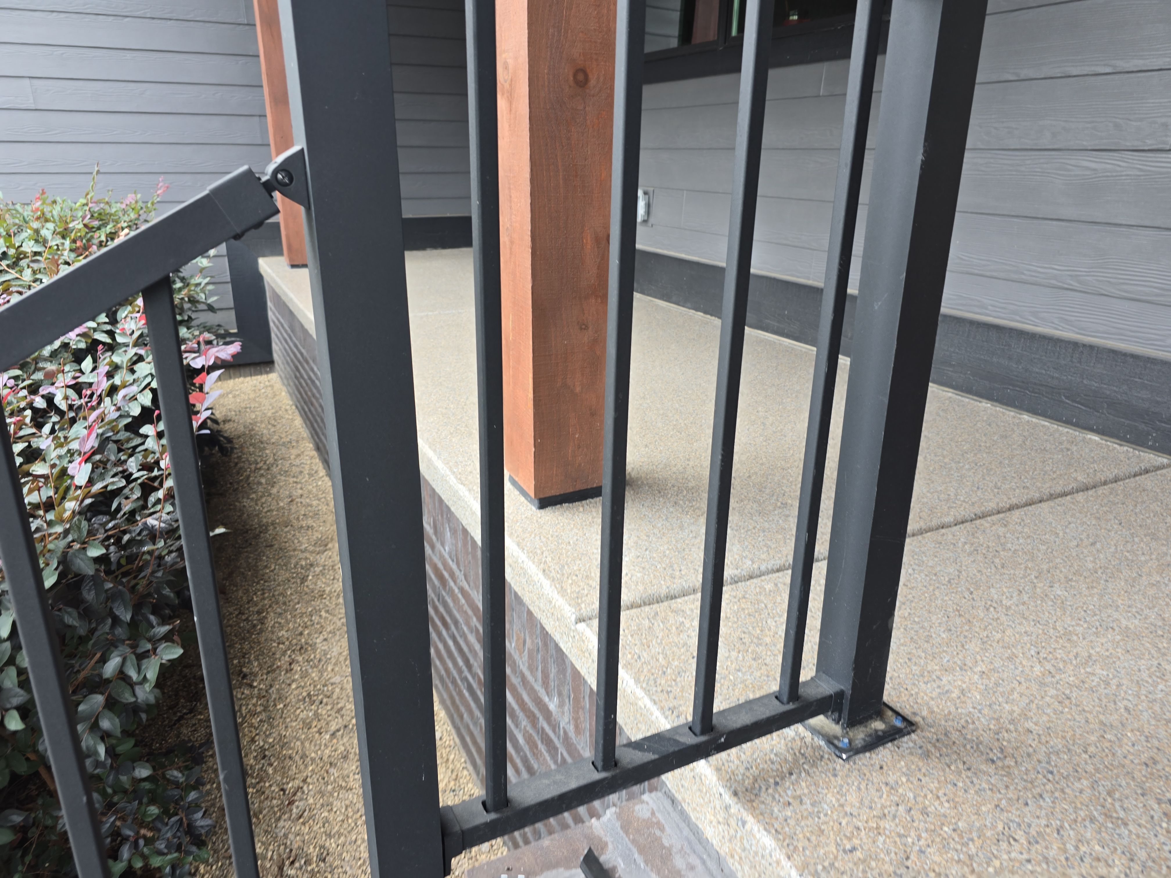 Front Porch and Garage using Obsidian by Elite Floor Solutions