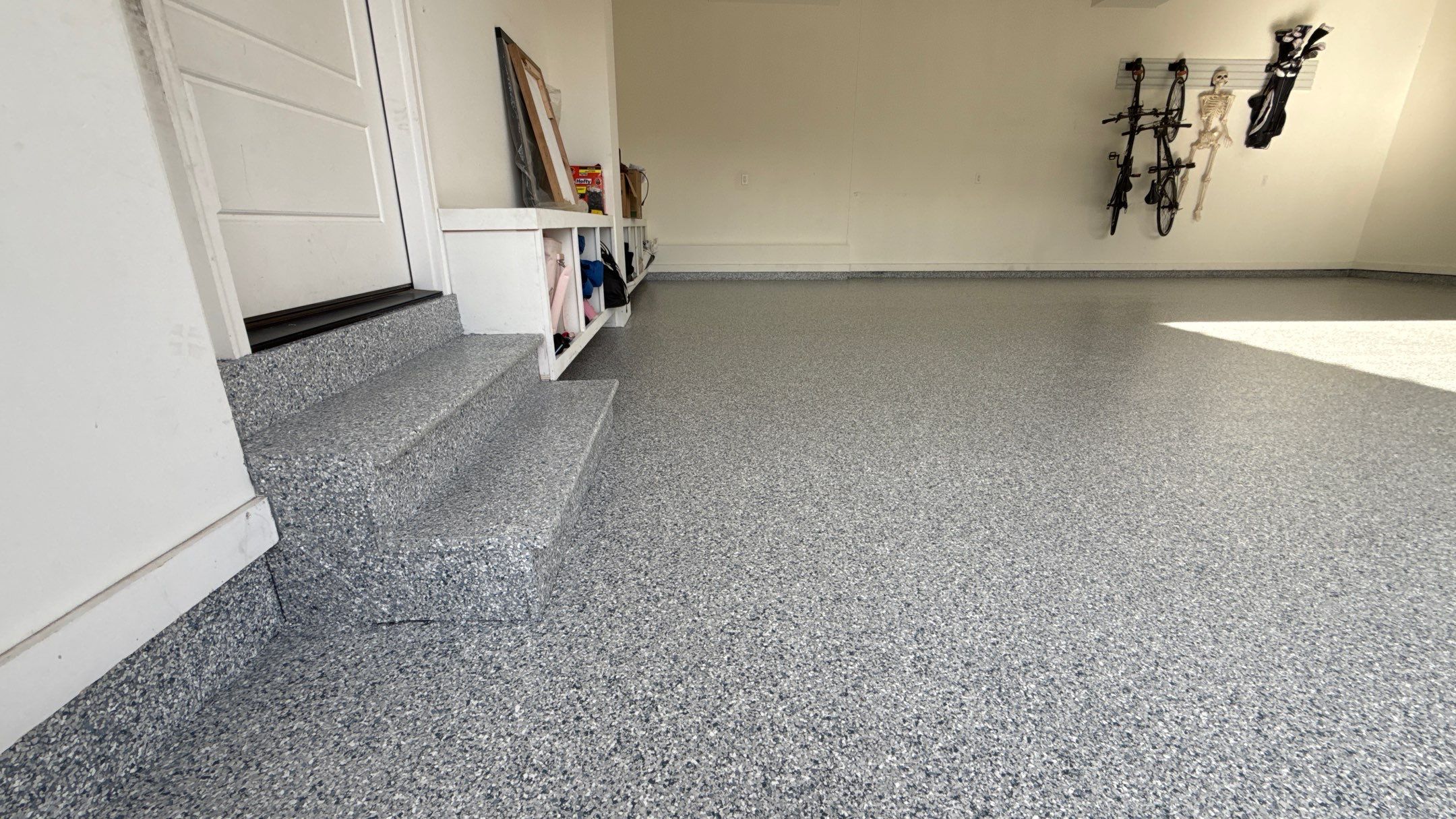 Nick's New Floor & Storage Looks Beautiful by Banner Garage