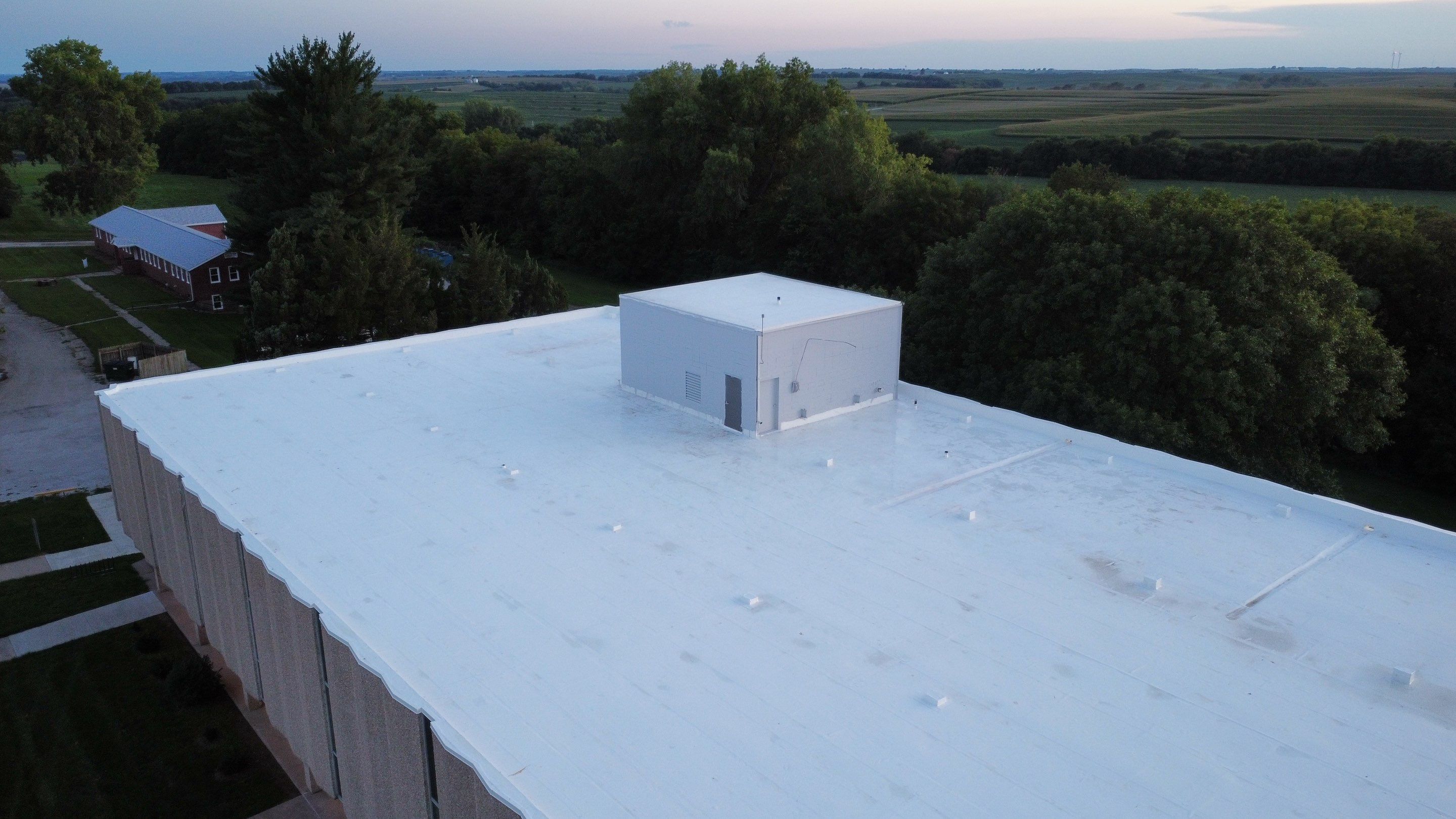 Commercial Flat Roof IB PVC Install  by Titan Commercial & Residential Roofing 