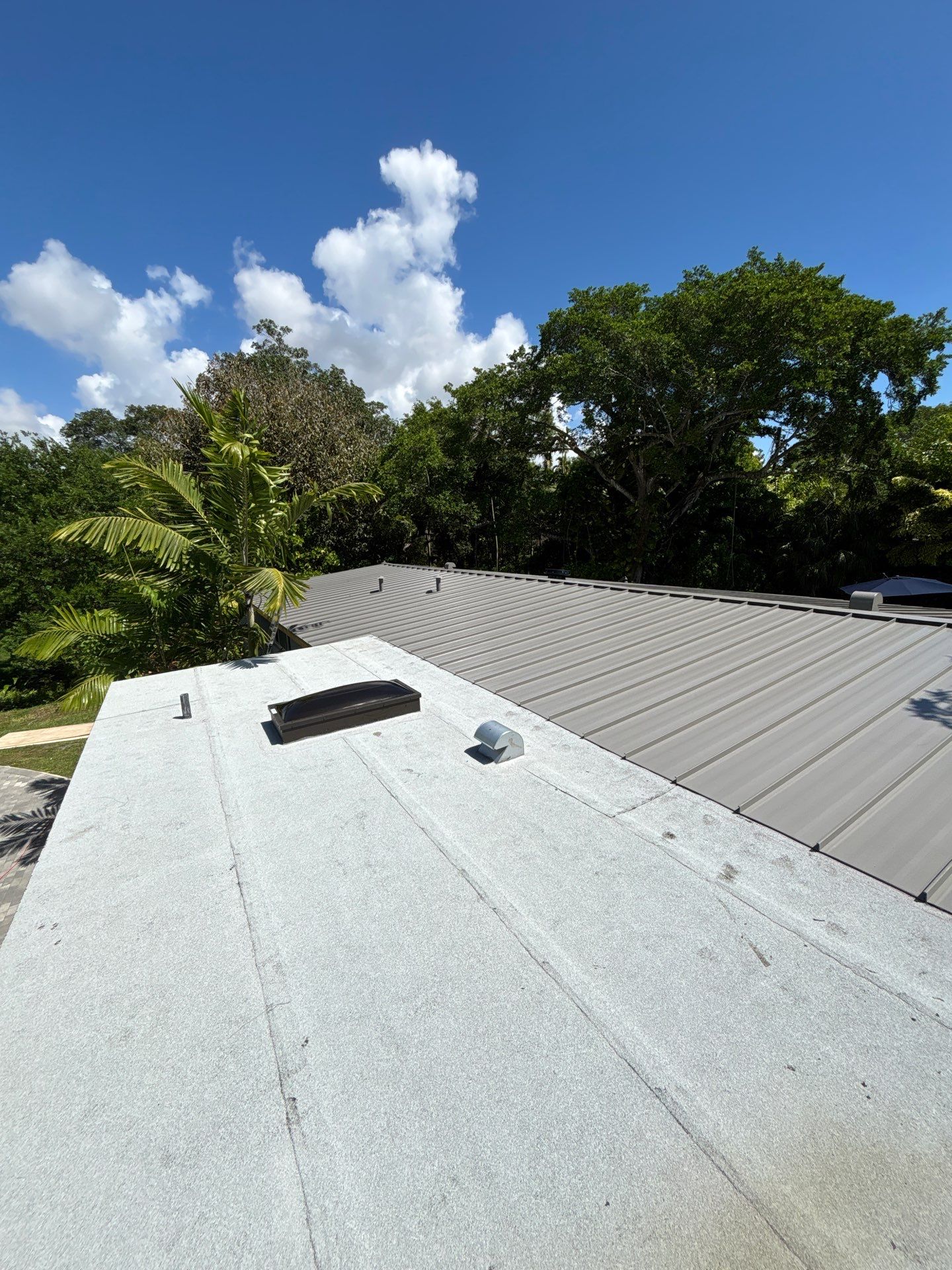 Metal Roof Replacement by Art's Roofing & Construction