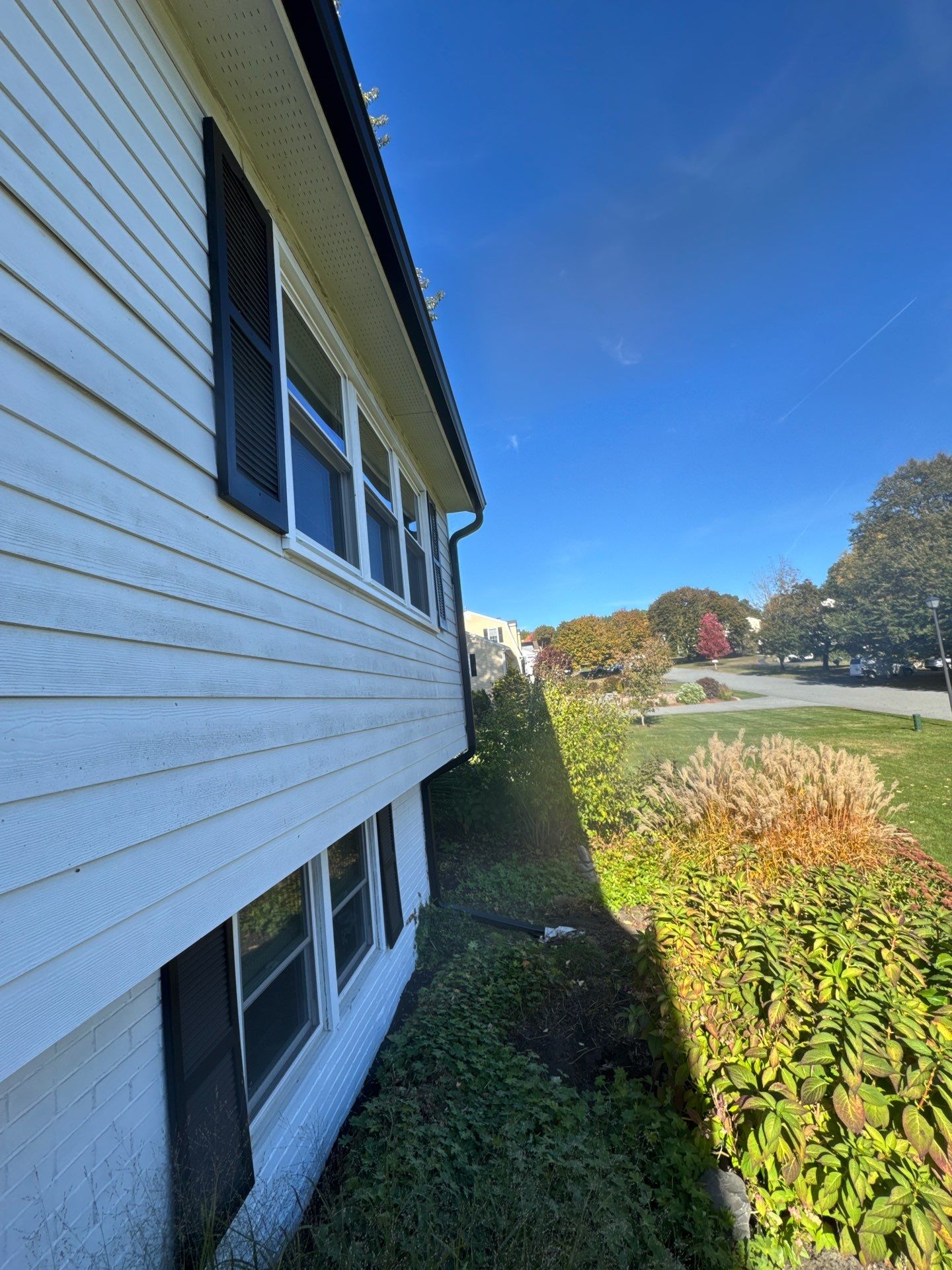 Seamless Black Gutter & Fascia Upgrade | Methuen, MA by Mighty Dog Roofing of Greater Middlesex County