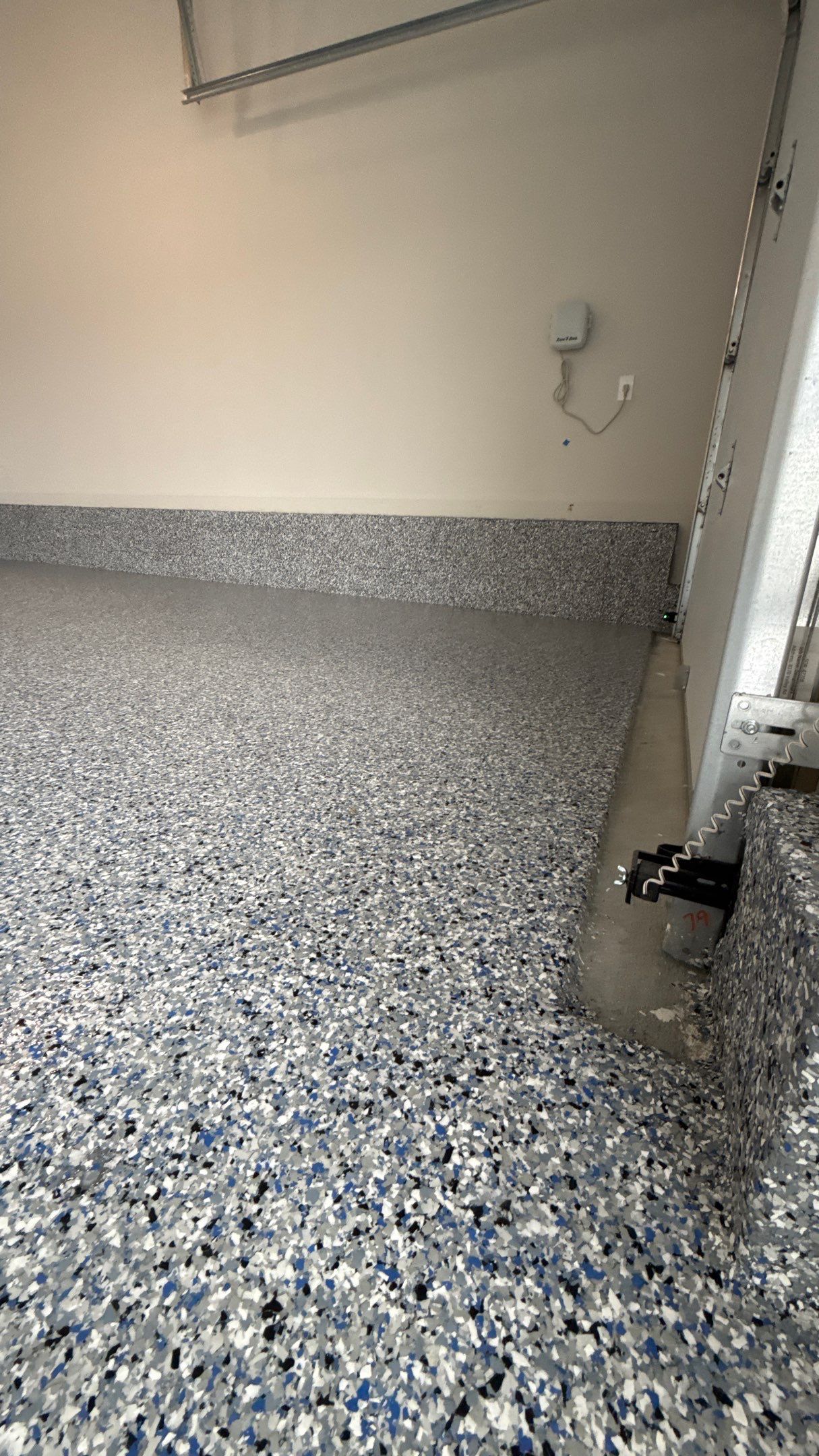 A Beautiful Comet Flake Floor  by Banner Garage