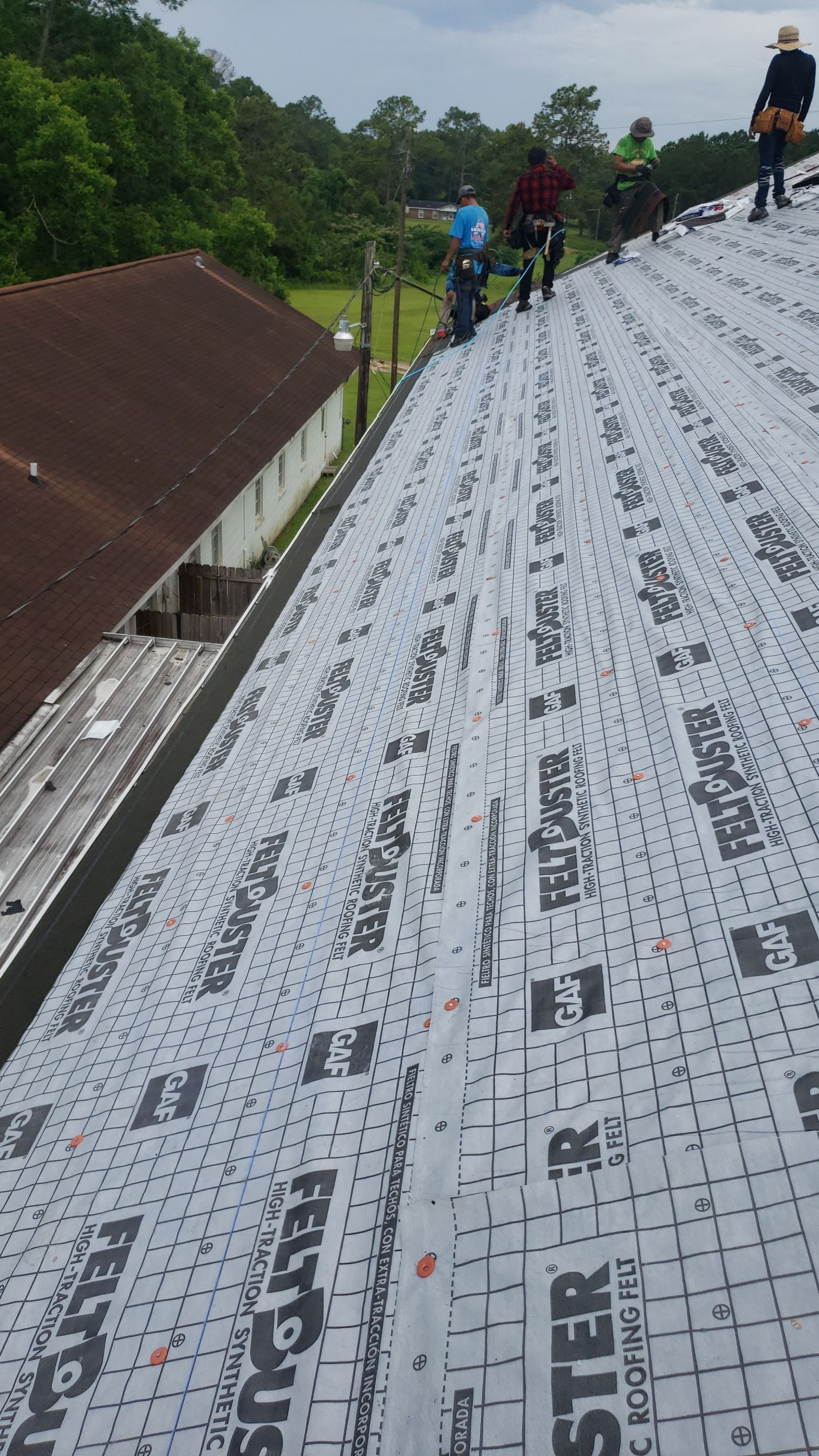 Residential Roofing Installation using Roof Replacement by American Roofing & Construction LLC