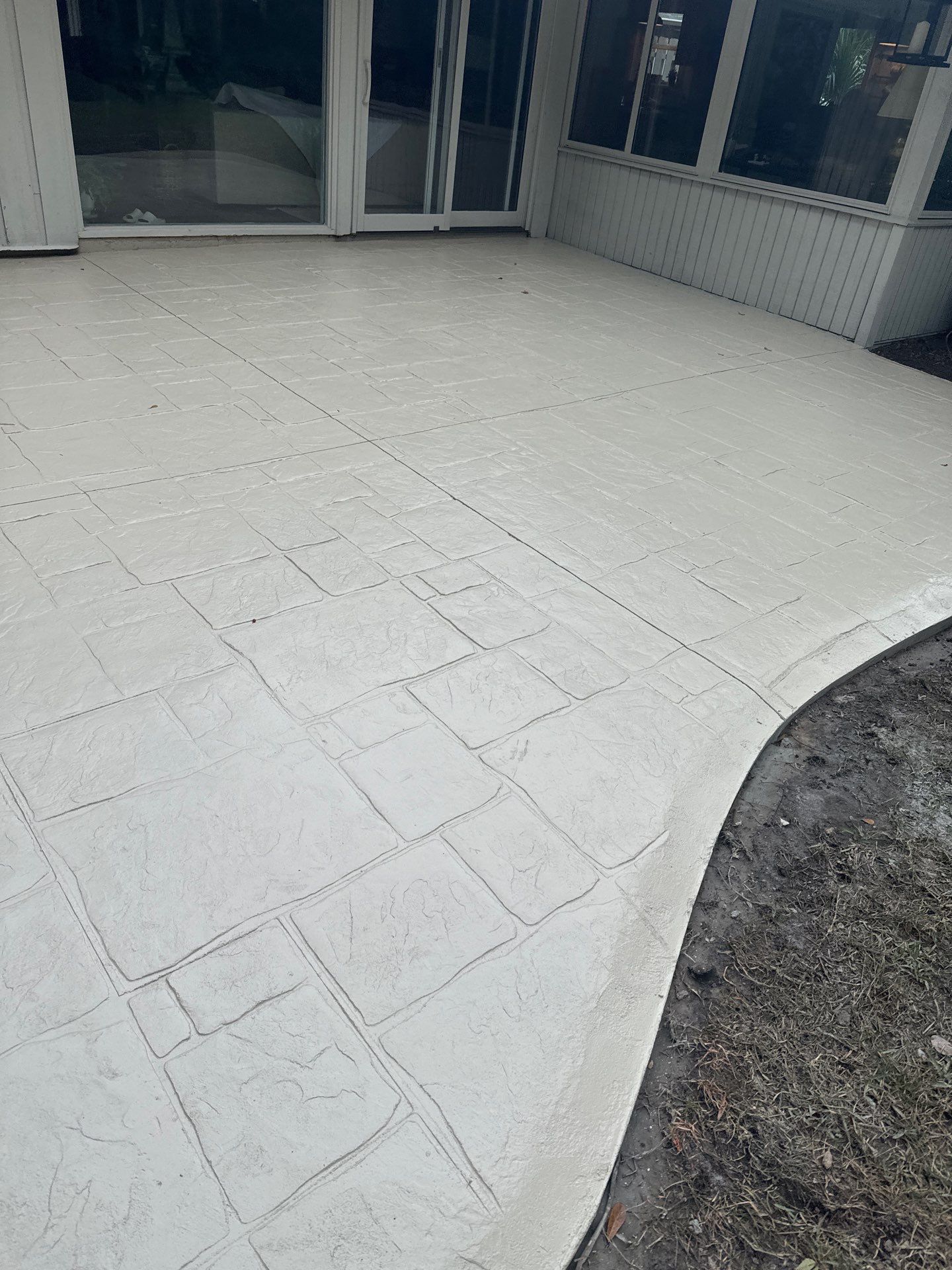 Ashlar Slate Stamped Concrete Patio Installation in Hilton Head Island by Lowcountry Scapes, LLC