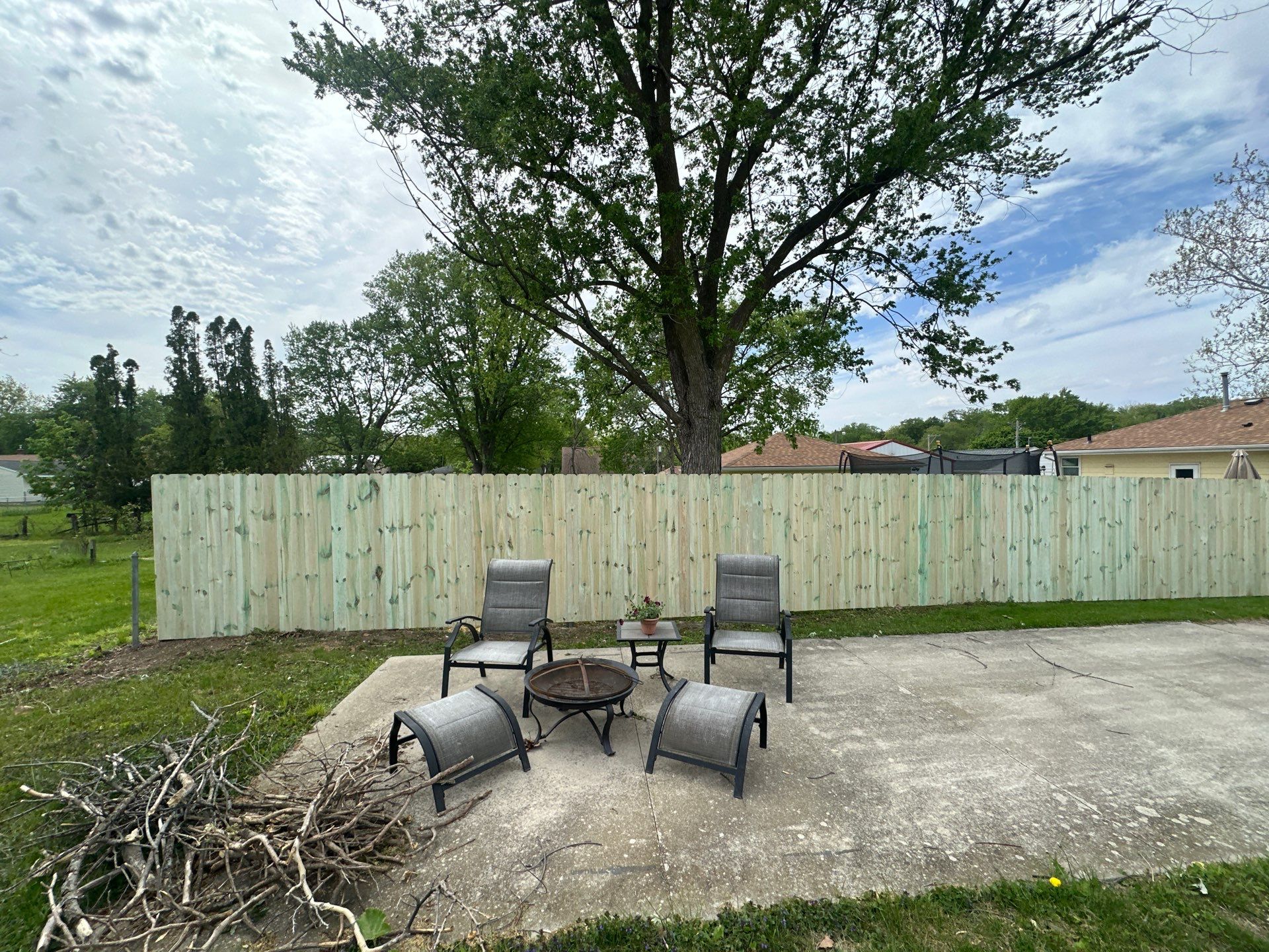 Pressure-Treated Wood Privacy Fence Installation in Waterloo by Perfect Picket Fence and Stain