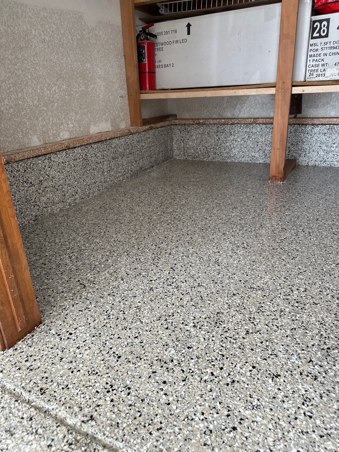 Two-Stall Epoxy Garage Floor Coating and Repair in Lincoln by Goat Coatings