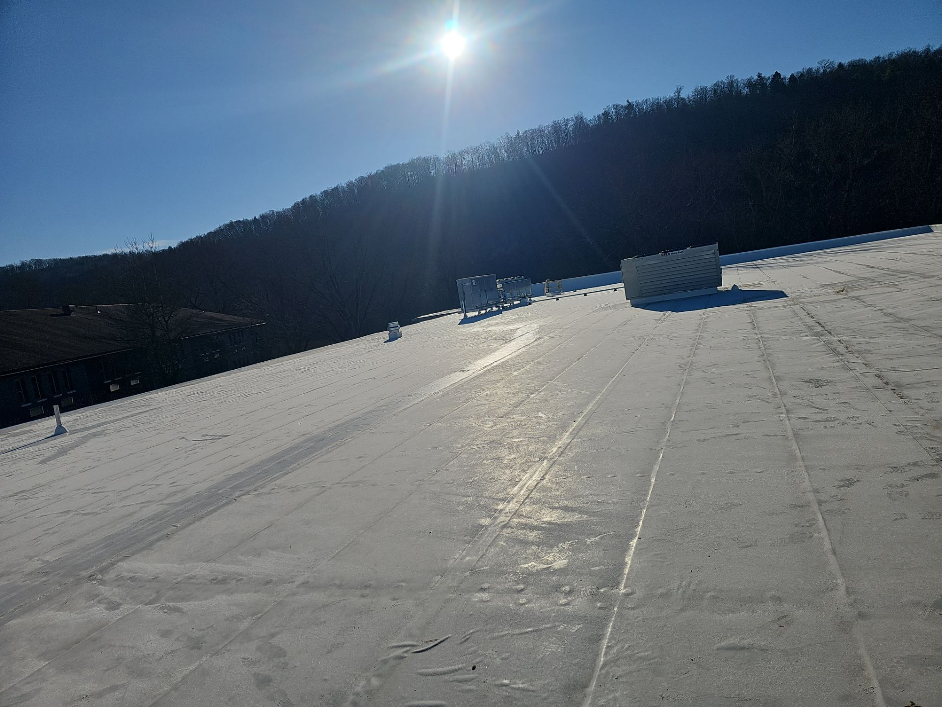 Commercial Roofing Installation using Insulated roof and wall panels by Nitro Roofing and Construction