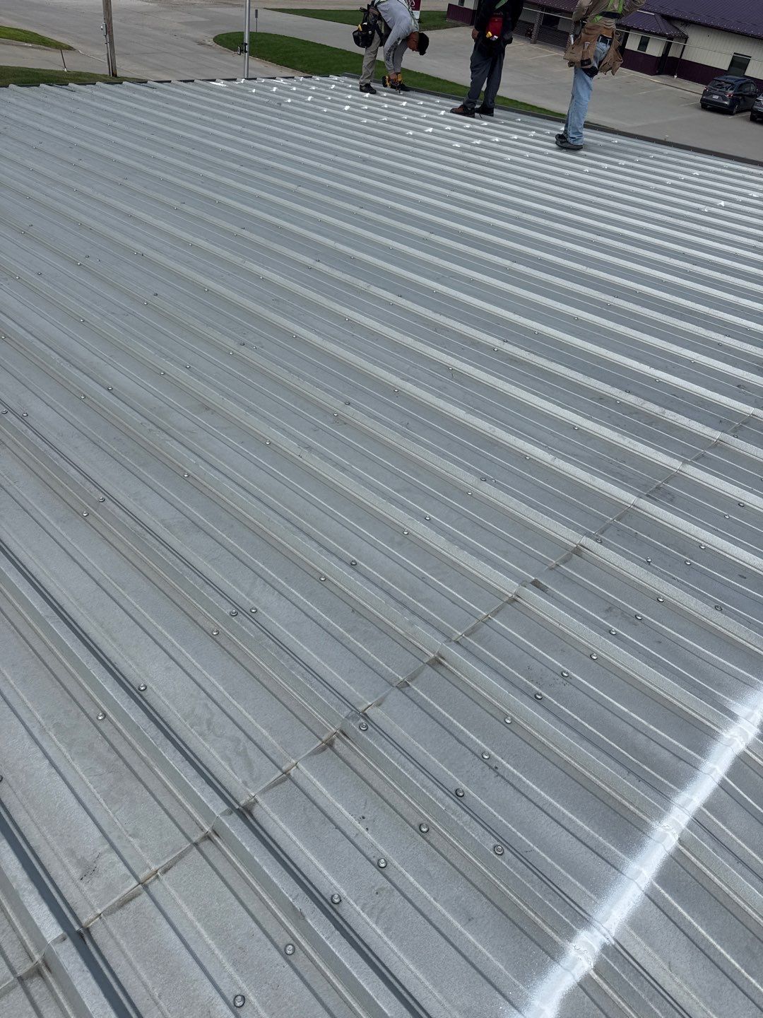Metal Roof Fastener Replacement and Seam Sealing in West Point, NE by Crows Roofing LLC