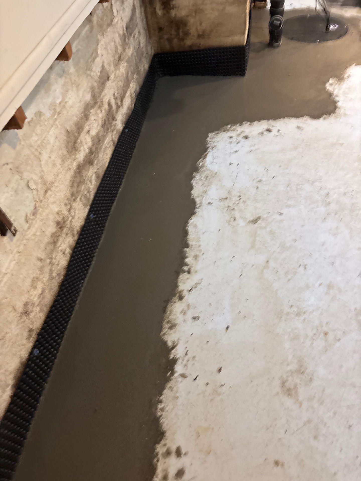 Interior Drain Tile & Sump Pump Installation in St. Paul, MN by Waterproofing Northeast