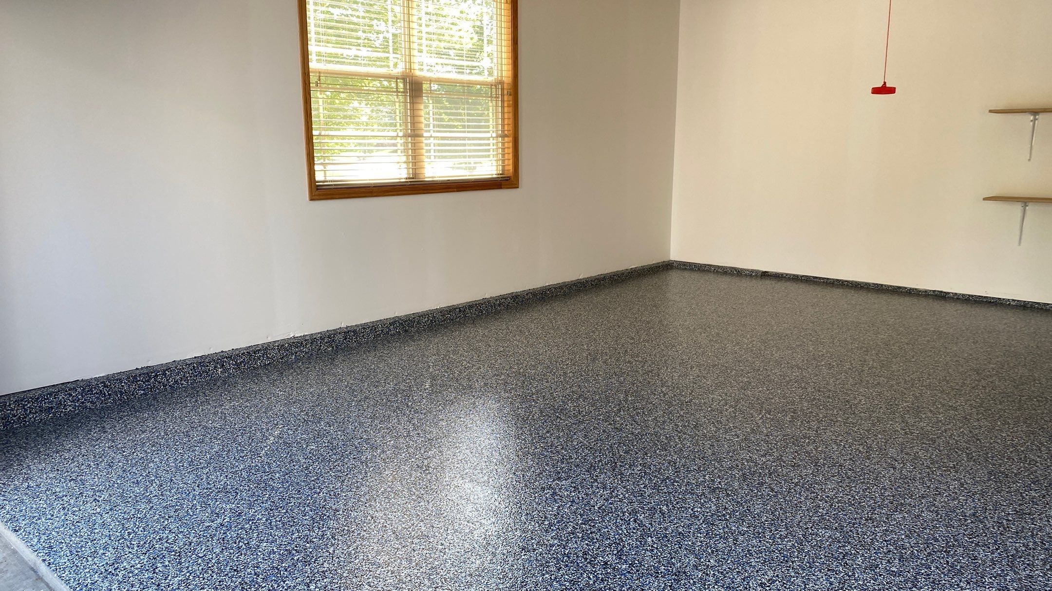 Suzie S. gets a new garage floor in Banner Blue! by Banner Garage
