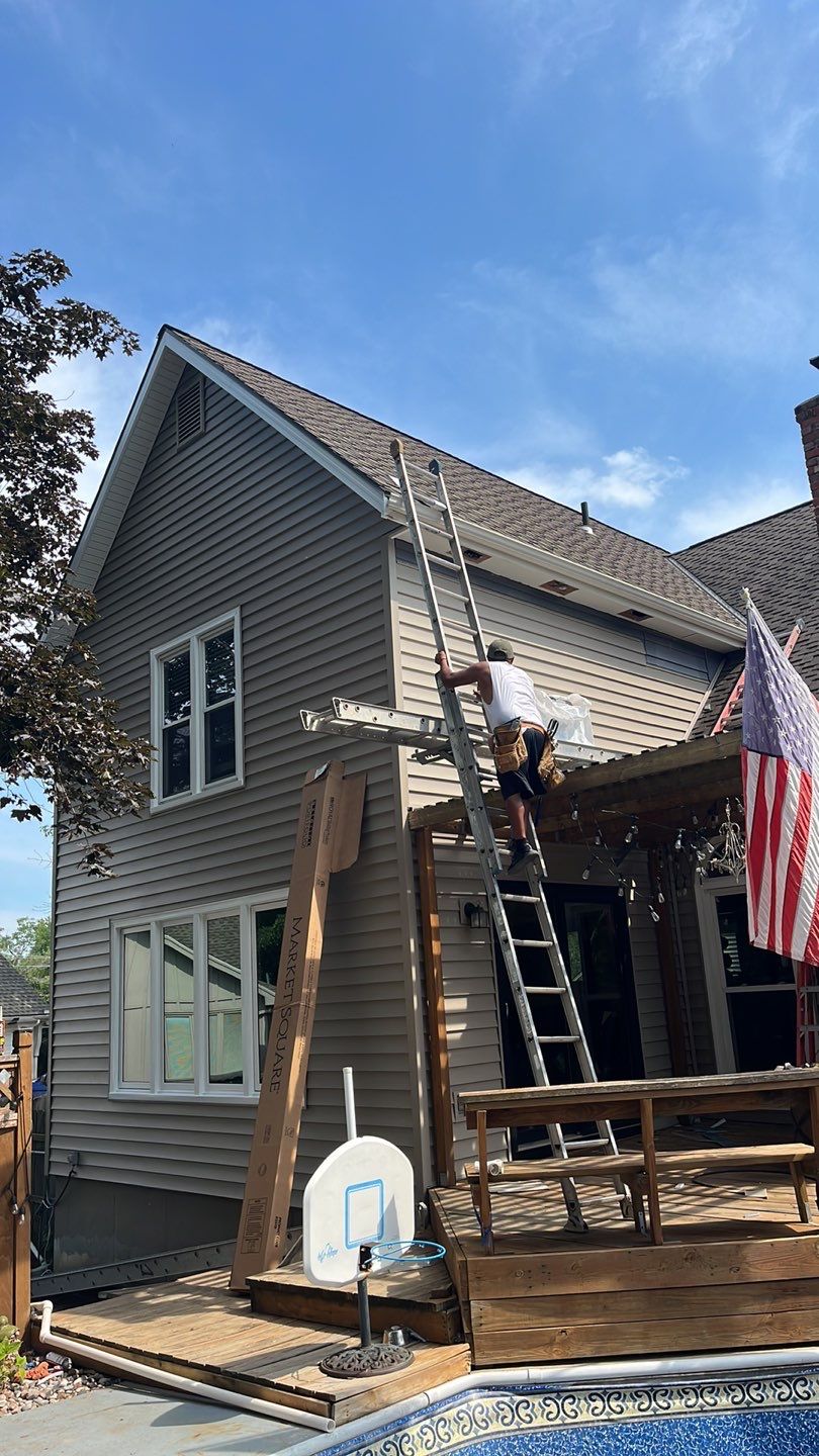 All New Craneboard D7 siding and New prefinished front door   by EEC  Windows, Siding & Roofing 