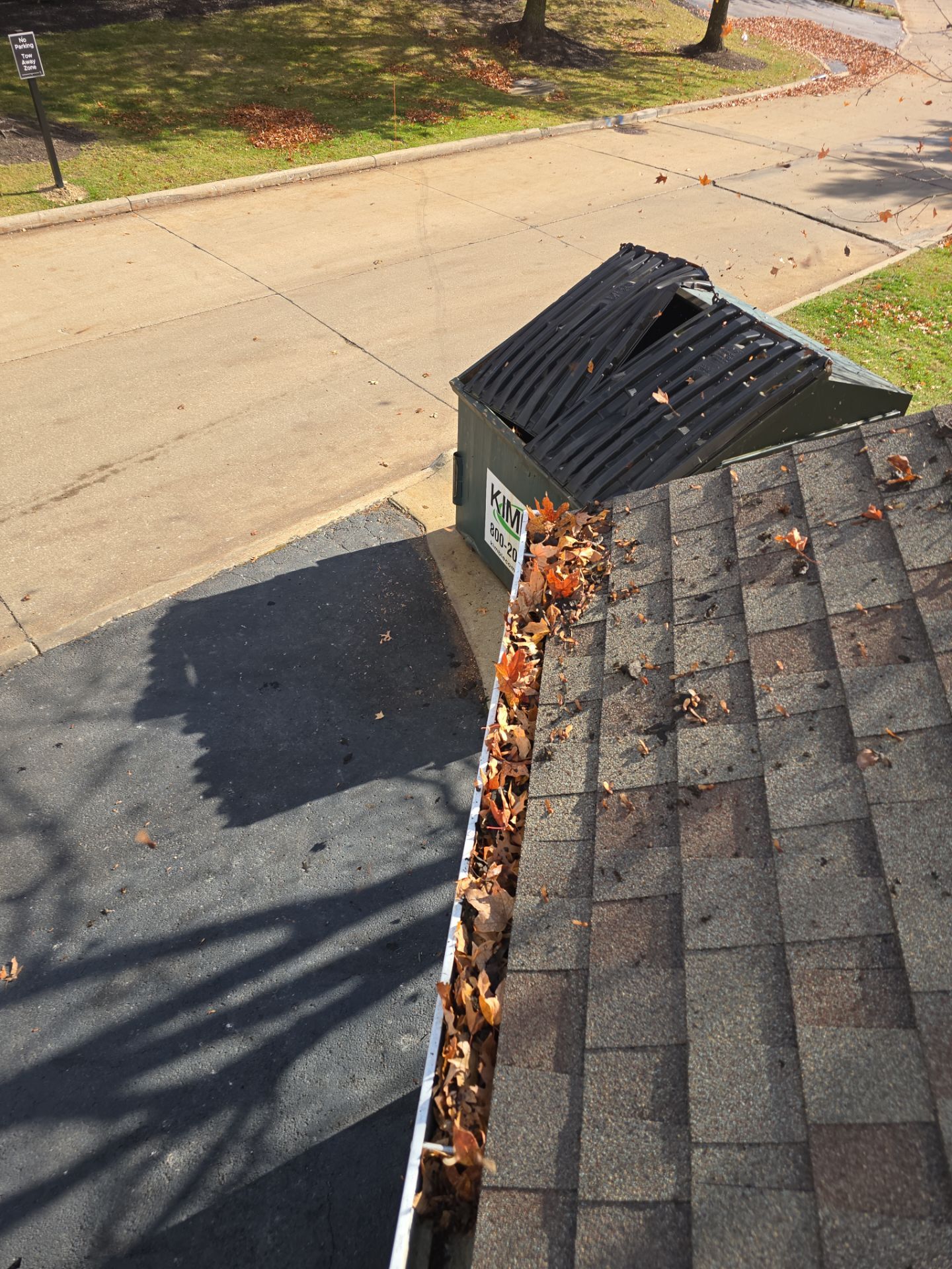 Commercial gutter cleaning Akron, OH before photo with filled gutters