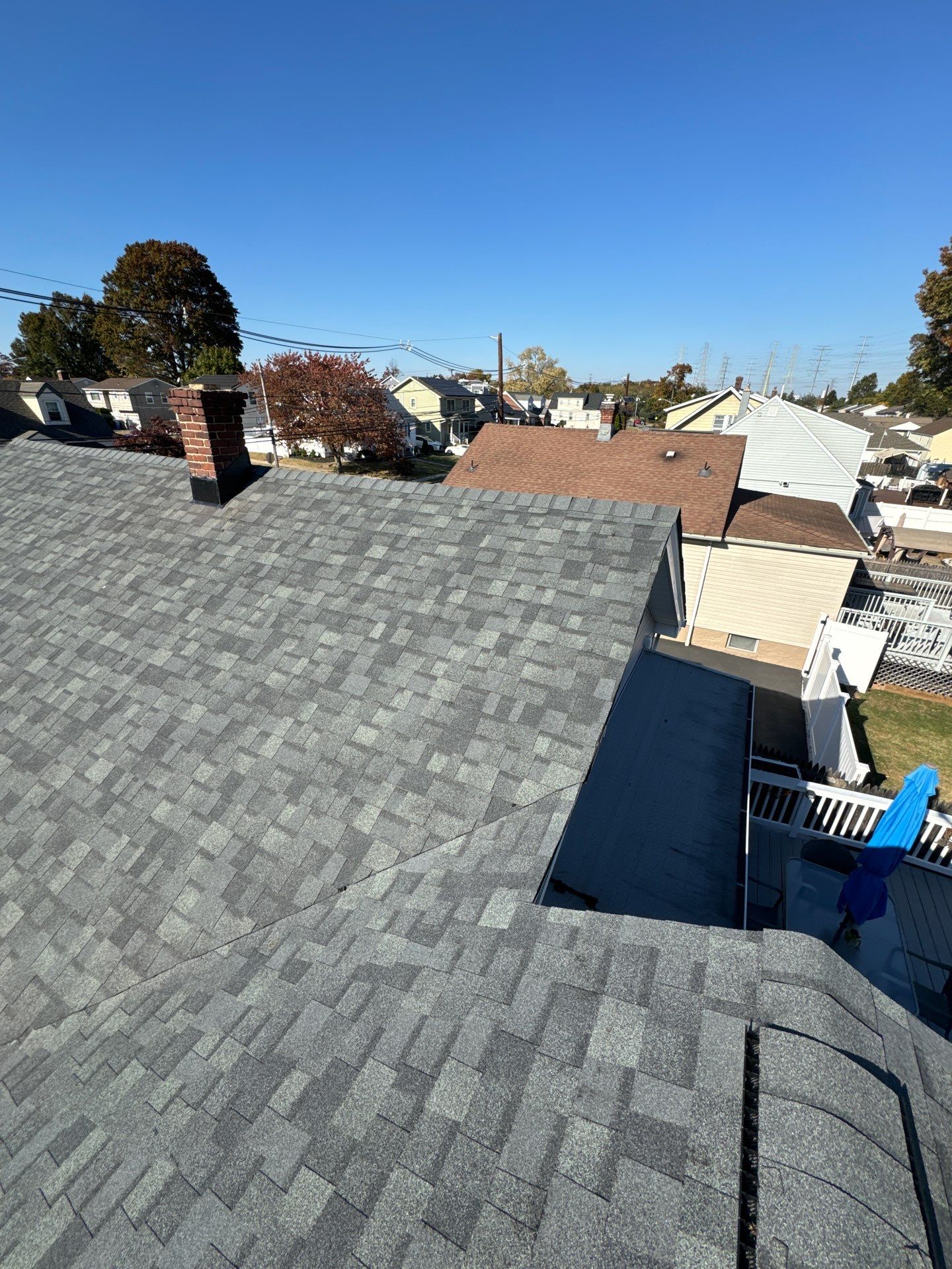 Estate Gray Shingles by Reimagine Roofing