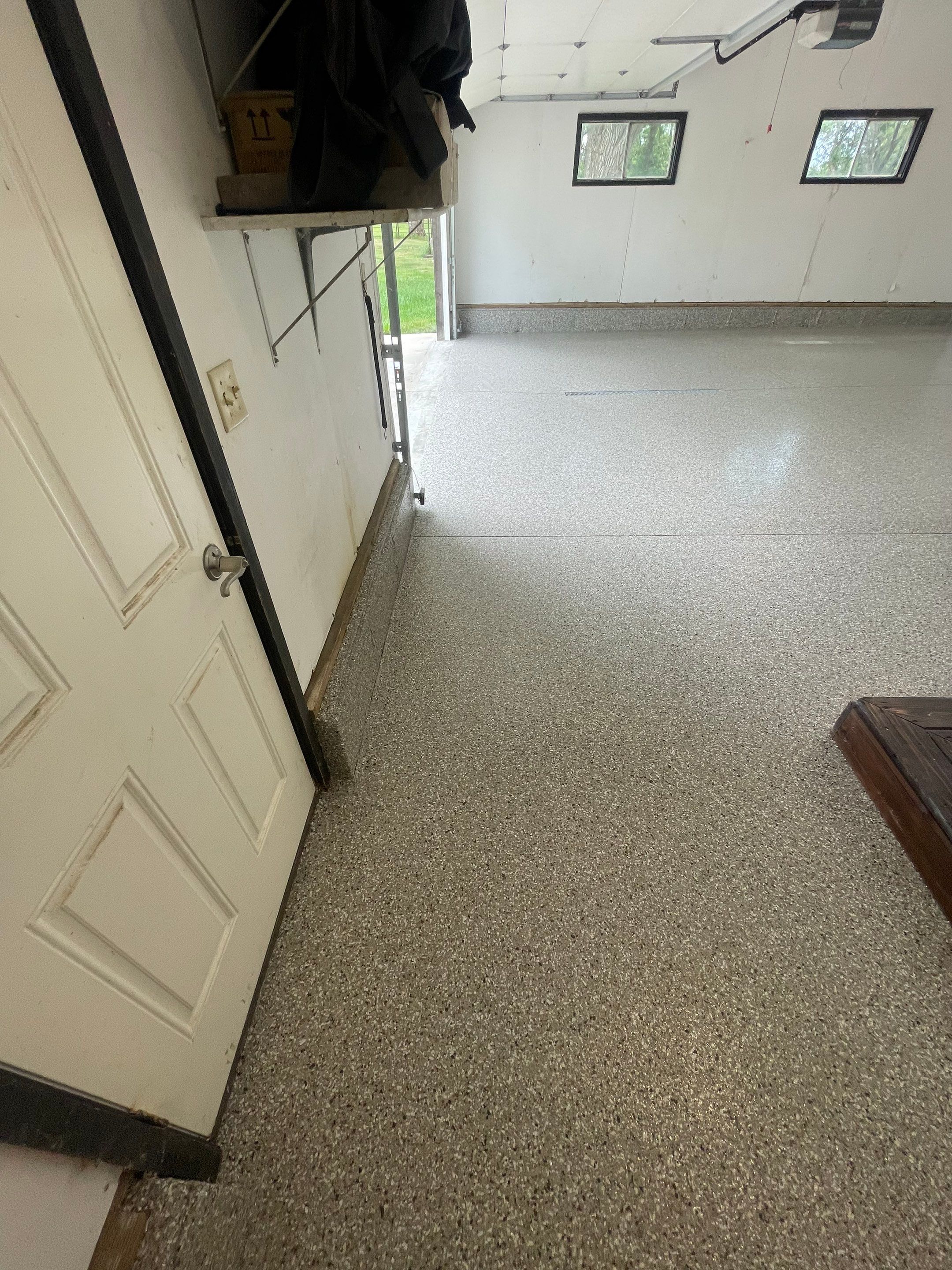 Hartford Residential Garage Floor Transformation With Decorative Chip Coating by Select Painting, Coatings & Garage Cabinets
