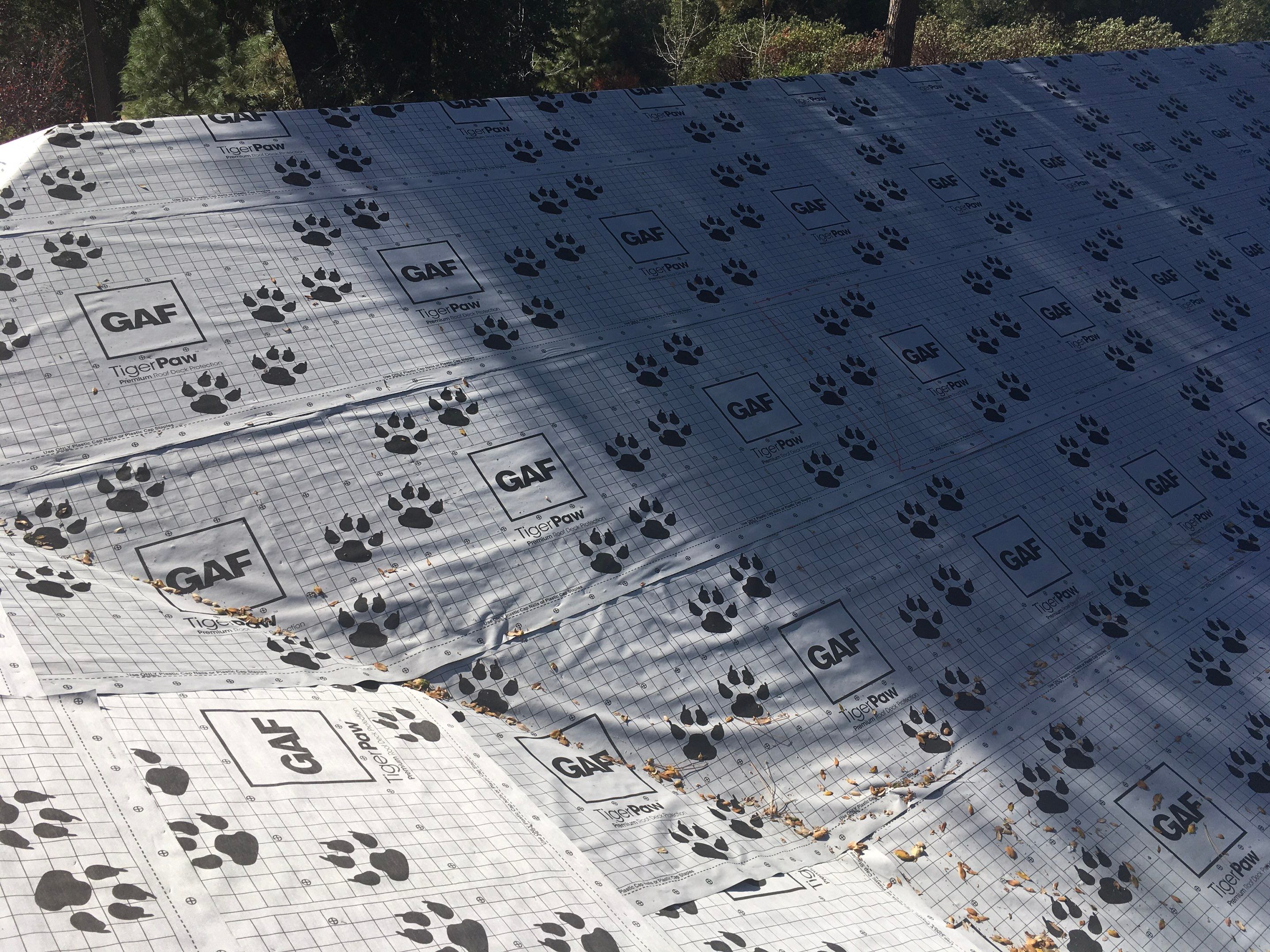 Metal roofing installation using Standing seam metal roofing system by Straight Edge Roofing Inc