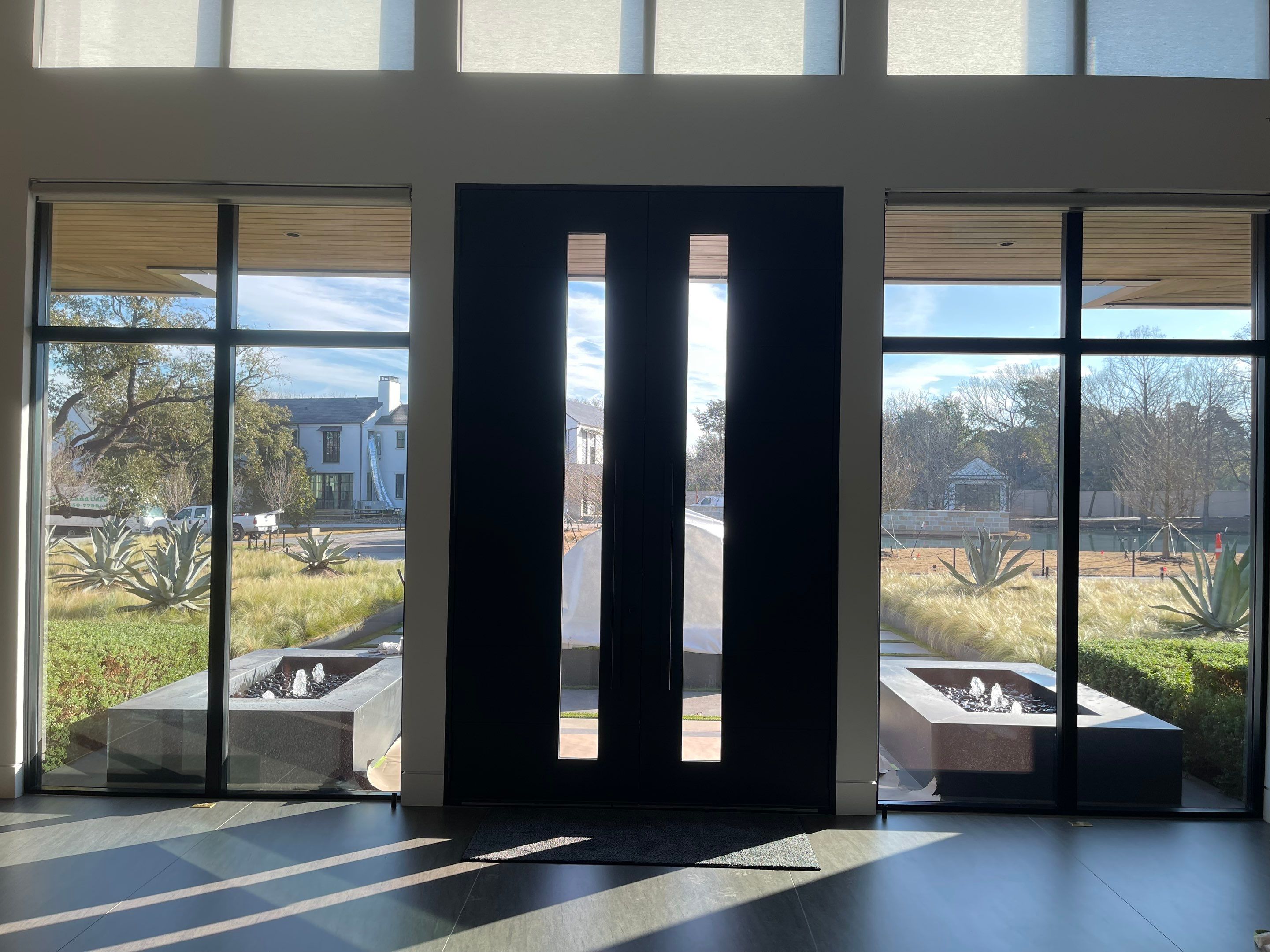 Modern Entry Door Installation and Custom Finishing in Dallas by Solara Custom Living
