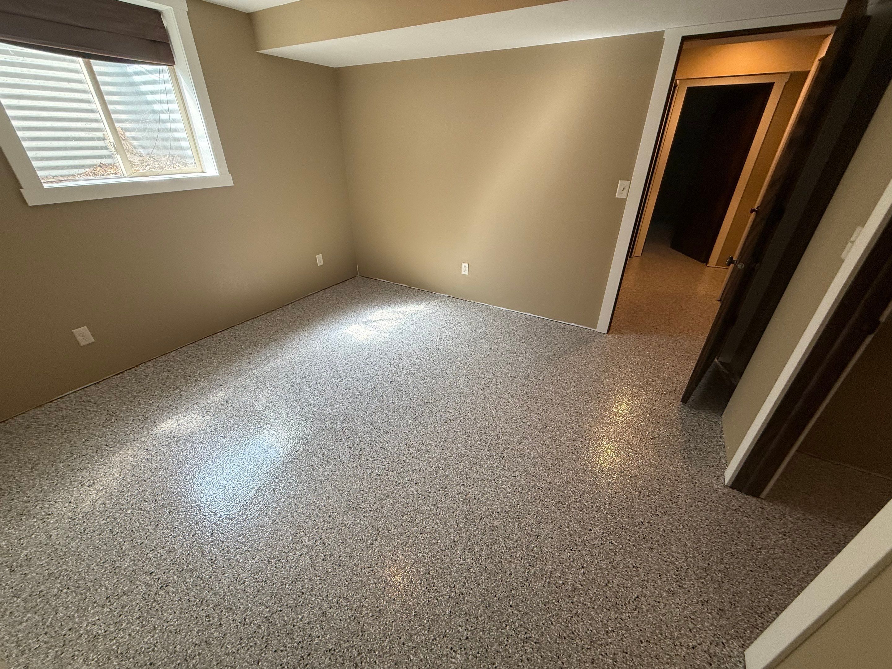 Decorative Flake Concrete Floor Coating for Larchwood Basement by Select Painting, Coatings & Garage Cabinets