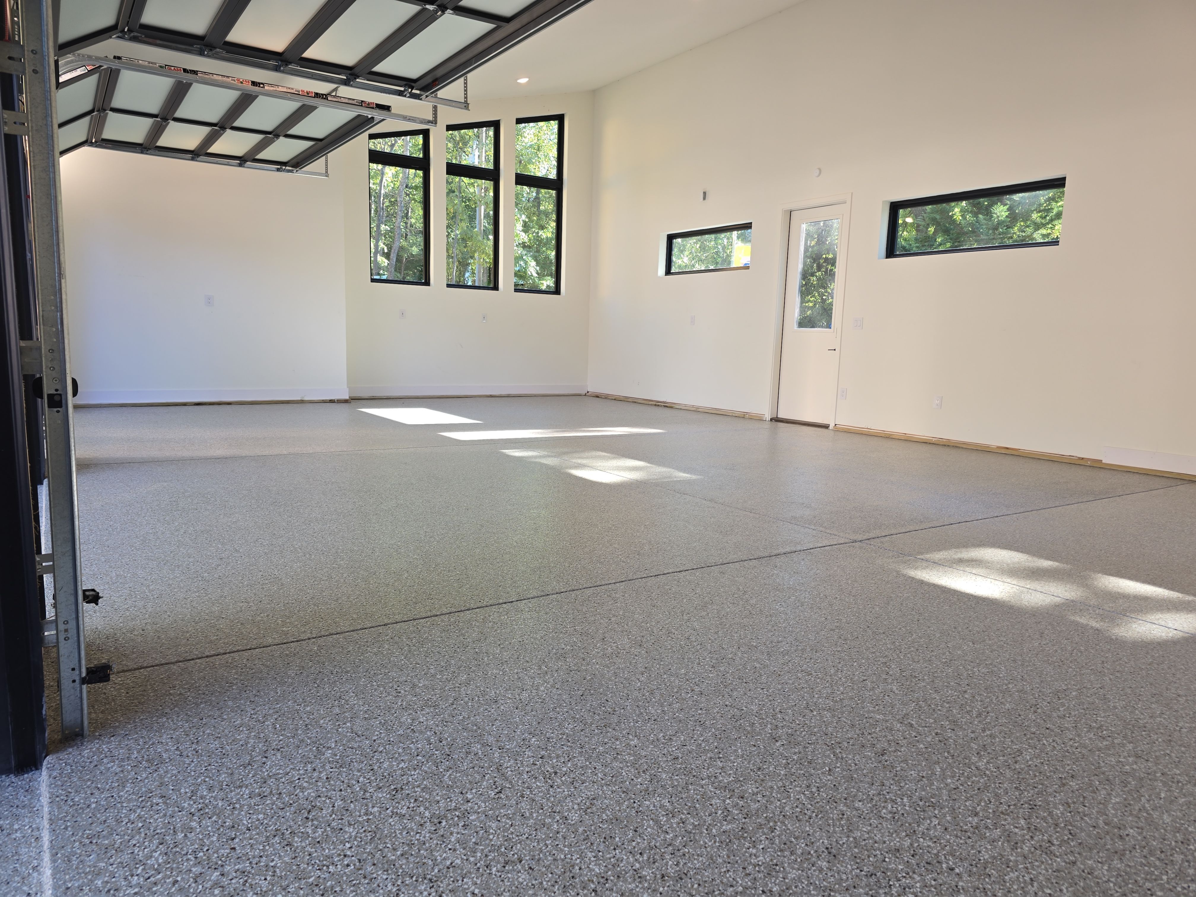 Garage using Creekbed by Elite Floor Solutions
