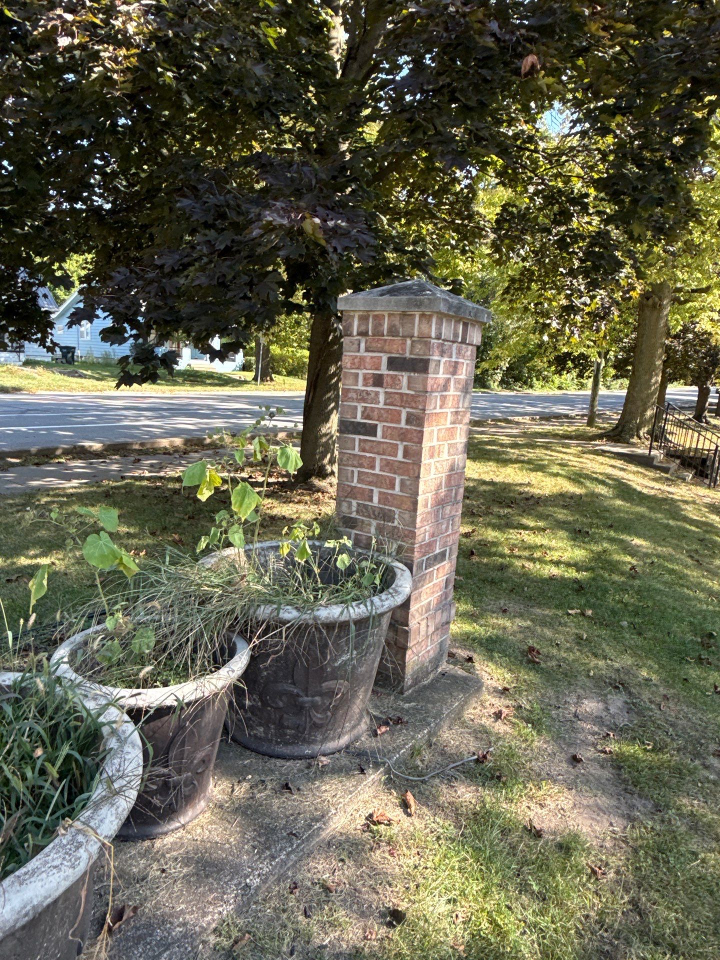 Monument Sign Installation Between Decorative Brick Pillars in South Bend by Hayes Design co