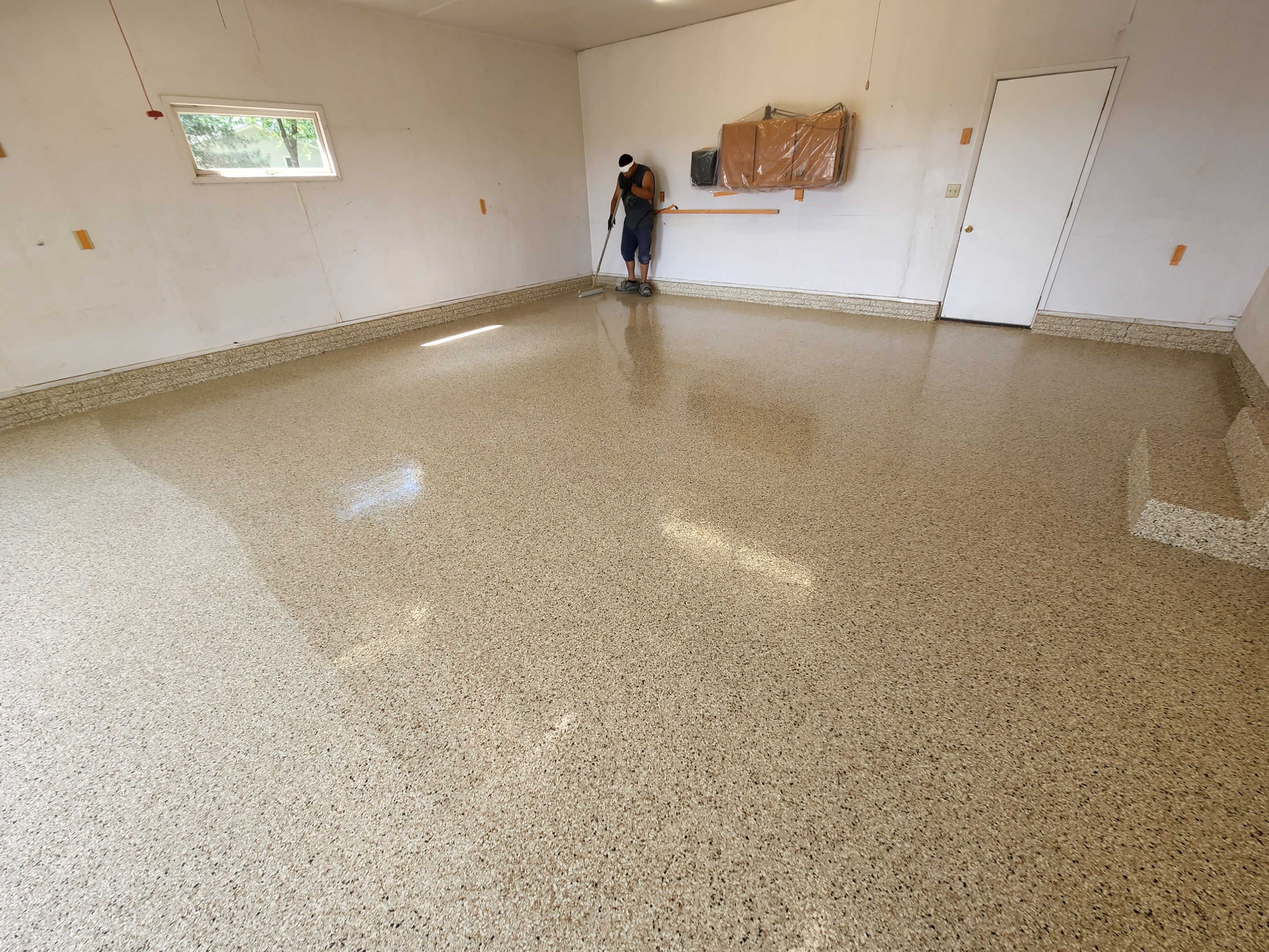 Garage using Driftwood by Select Painting, Coatings & Garage Cabinets