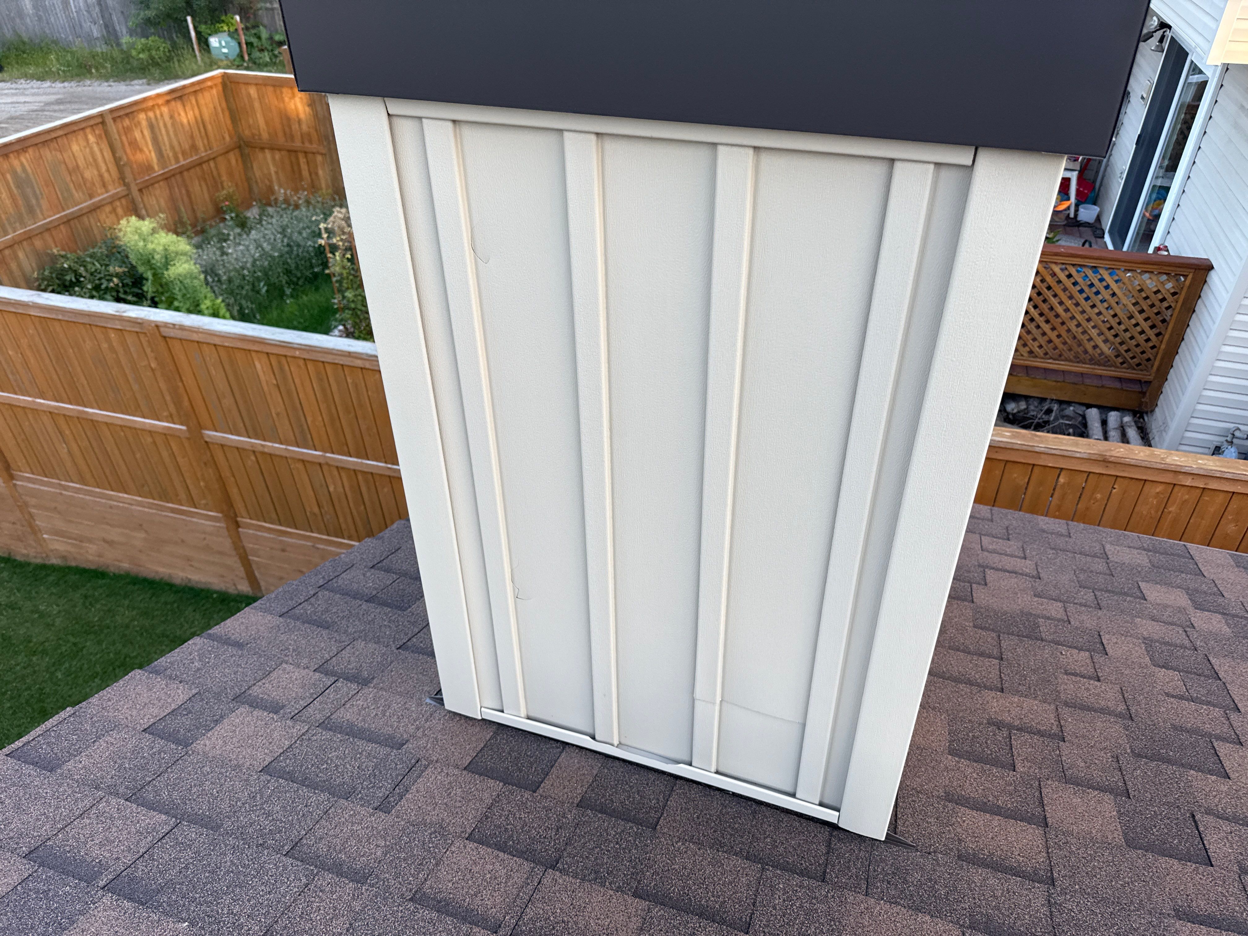 Calgary Chimney Chase Reconstruction and Exterior Siding Replacement by Smart Home Building Systems Ltd.
