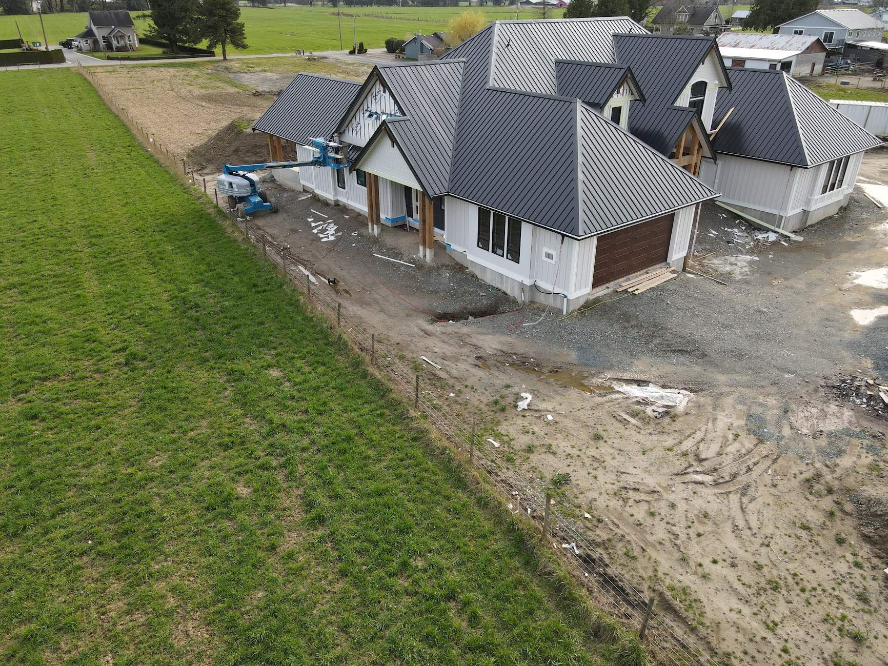 Residential Roofing Installation using 12" Prolok metal  by Top Notch Roofing Inc