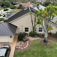24ga 1.5" Mechanical Seam Dark Bronze by Total Roofing System The Metal Roof Experts