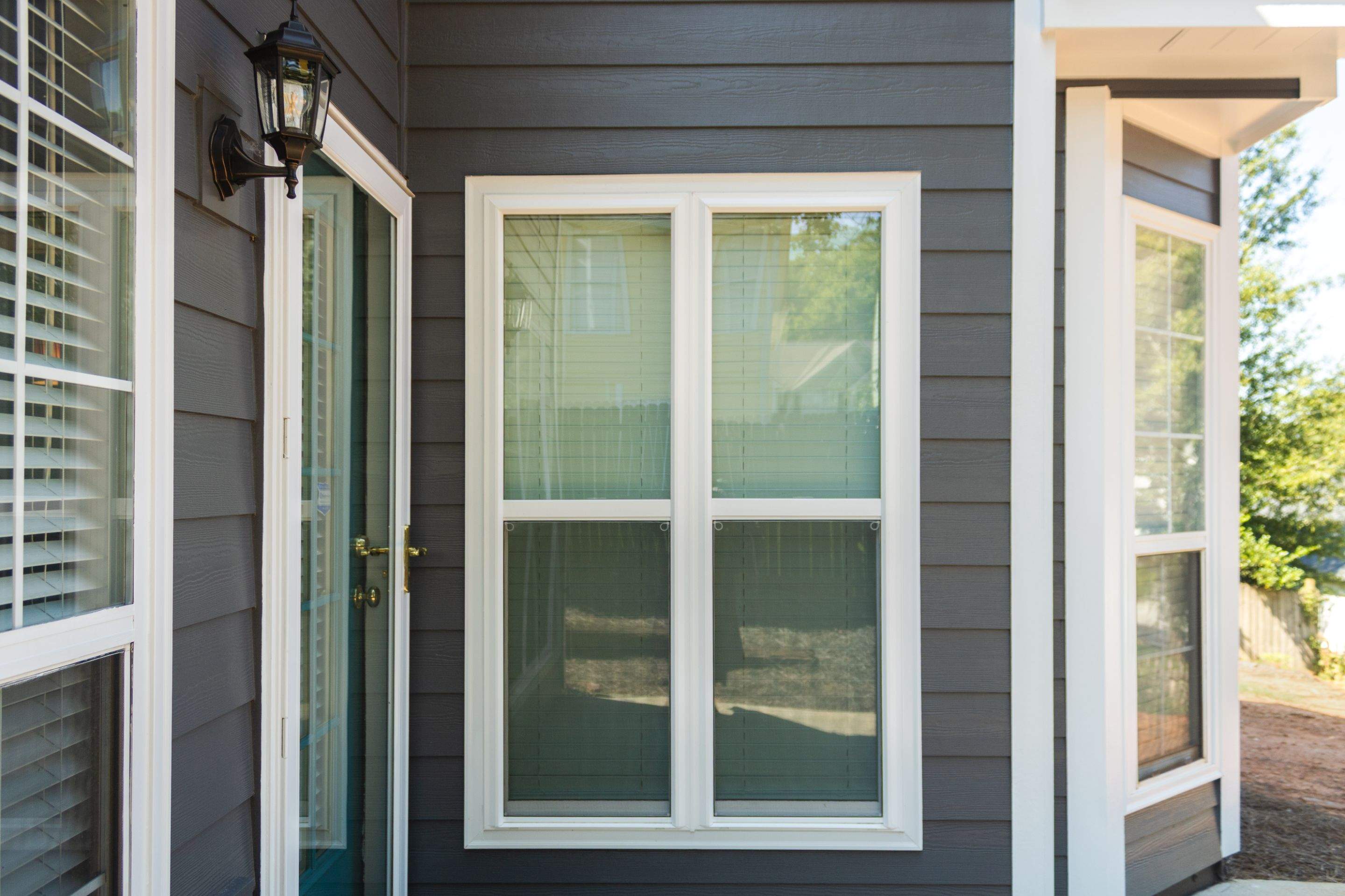 Lawrenceville, GA Full Siding Replacement, Exterior Painting, and Window Installation by Nelson Exteriors 