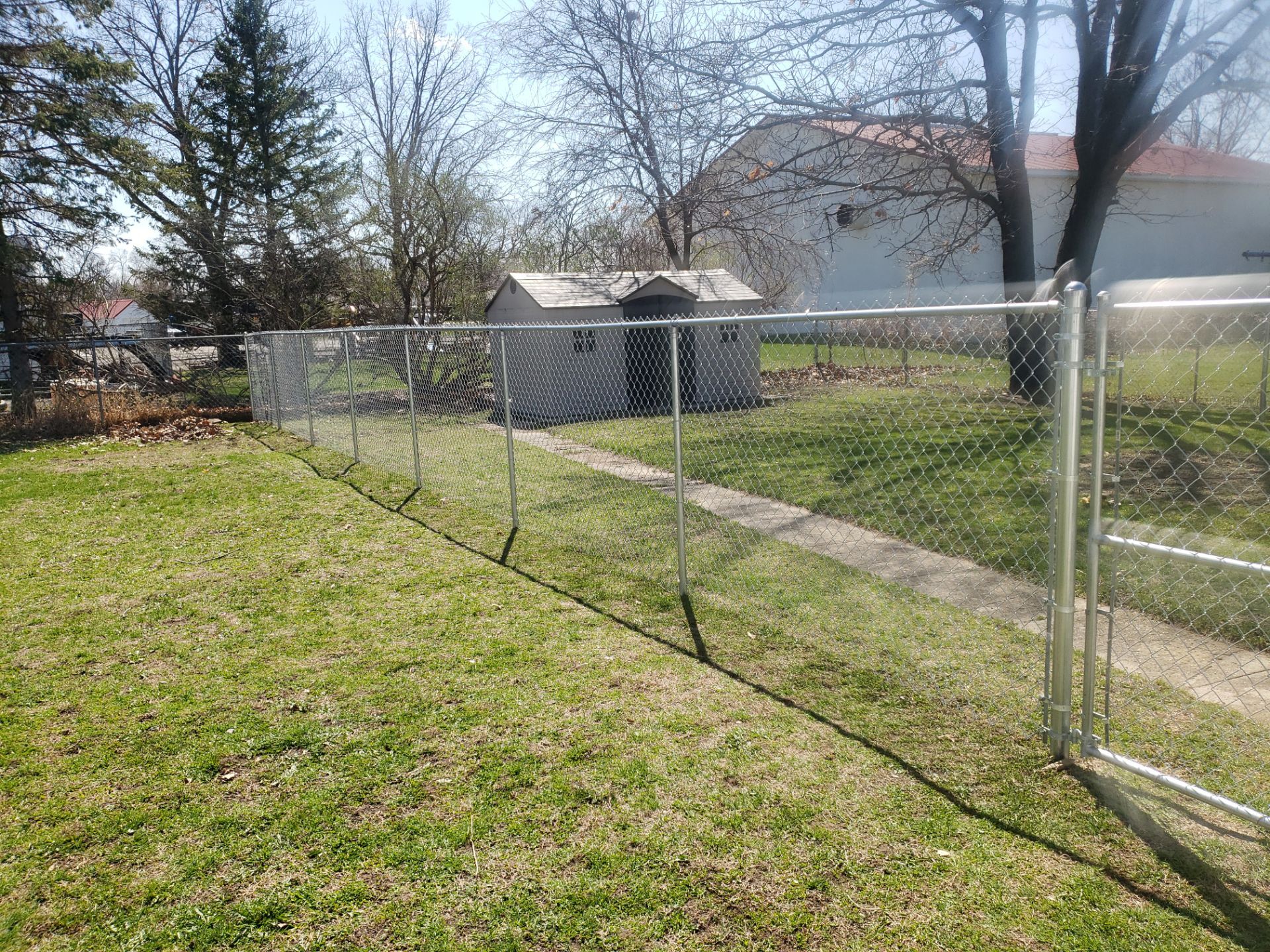 Residential Galvanized Chain Link Perimeter Fencing and Gate Installation by Perfect Picket Fence and Stain