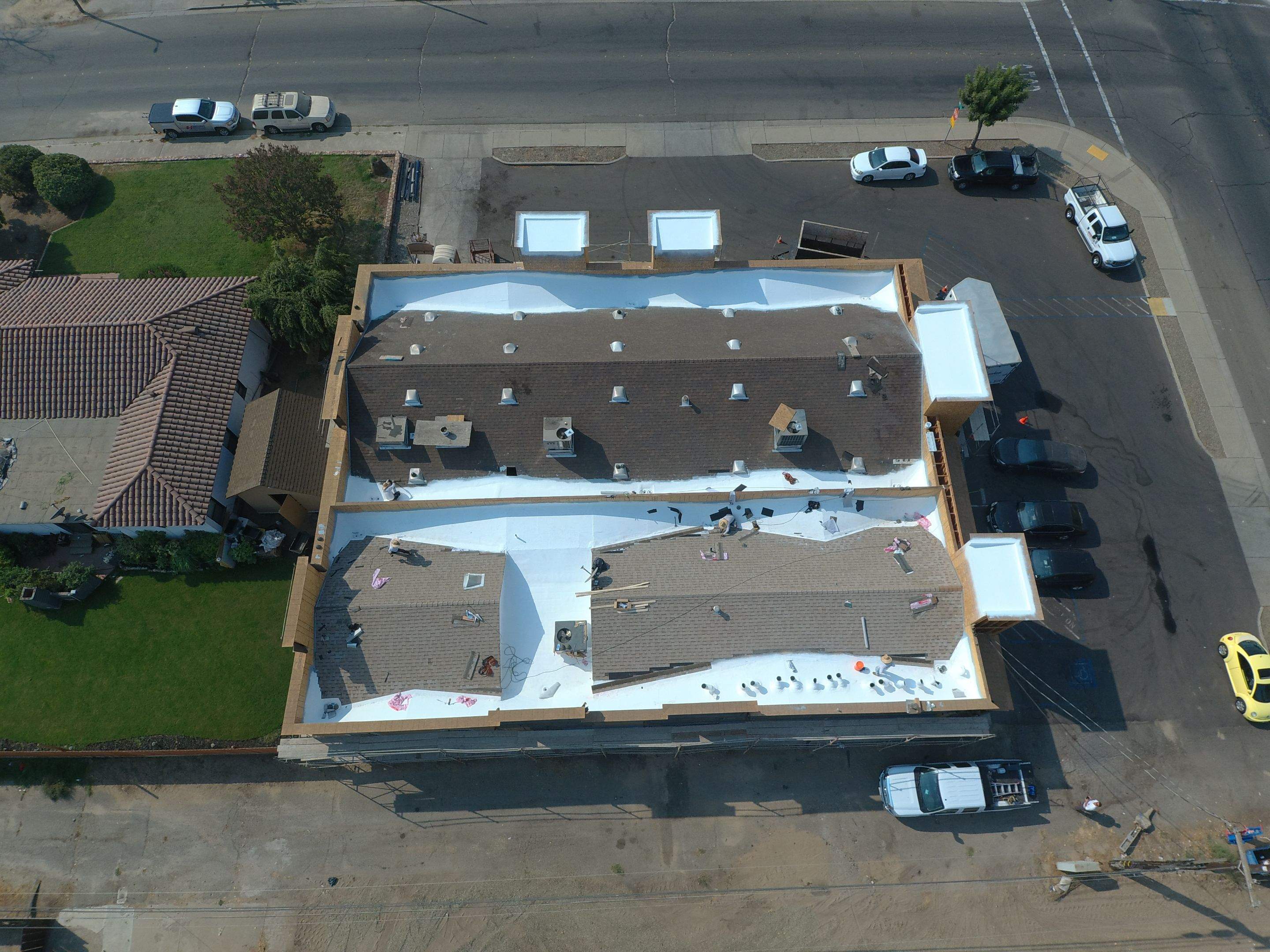 Spray foam and coatings using Conklin Benchmark/PUMA XL coatings and spray foam by Straight Edge Roofing Inc