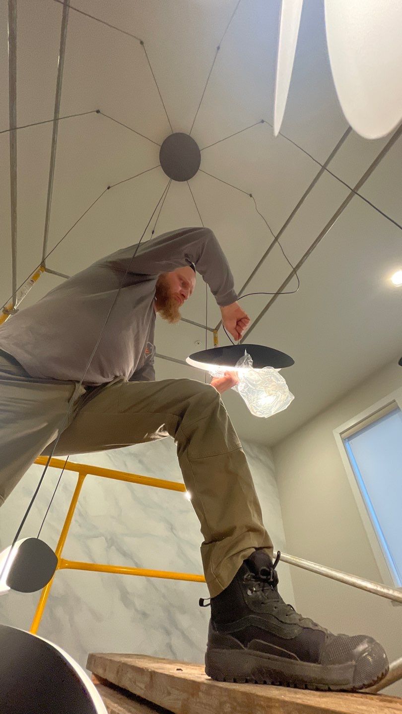 Chandelier Install  by HomeWerkes Design & Build