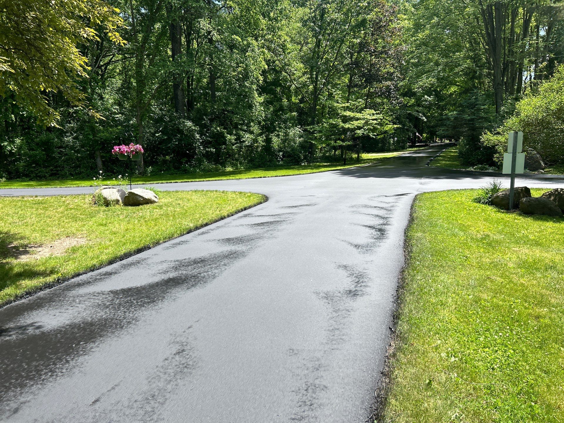 High end residential driveway by Quality Asphalt & Maintenance LLC