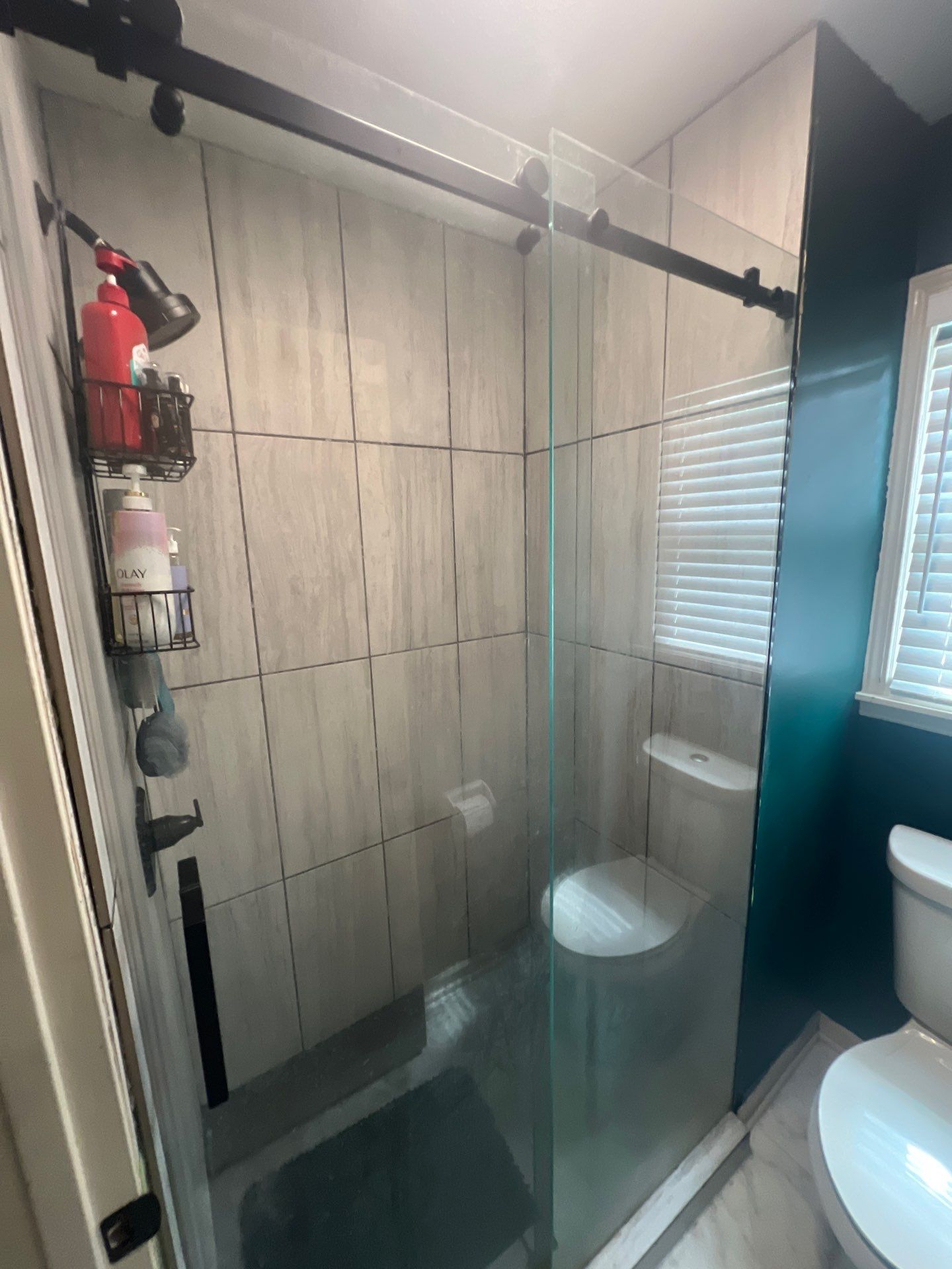 Tile out, Bella Stone in! by The Shower Company