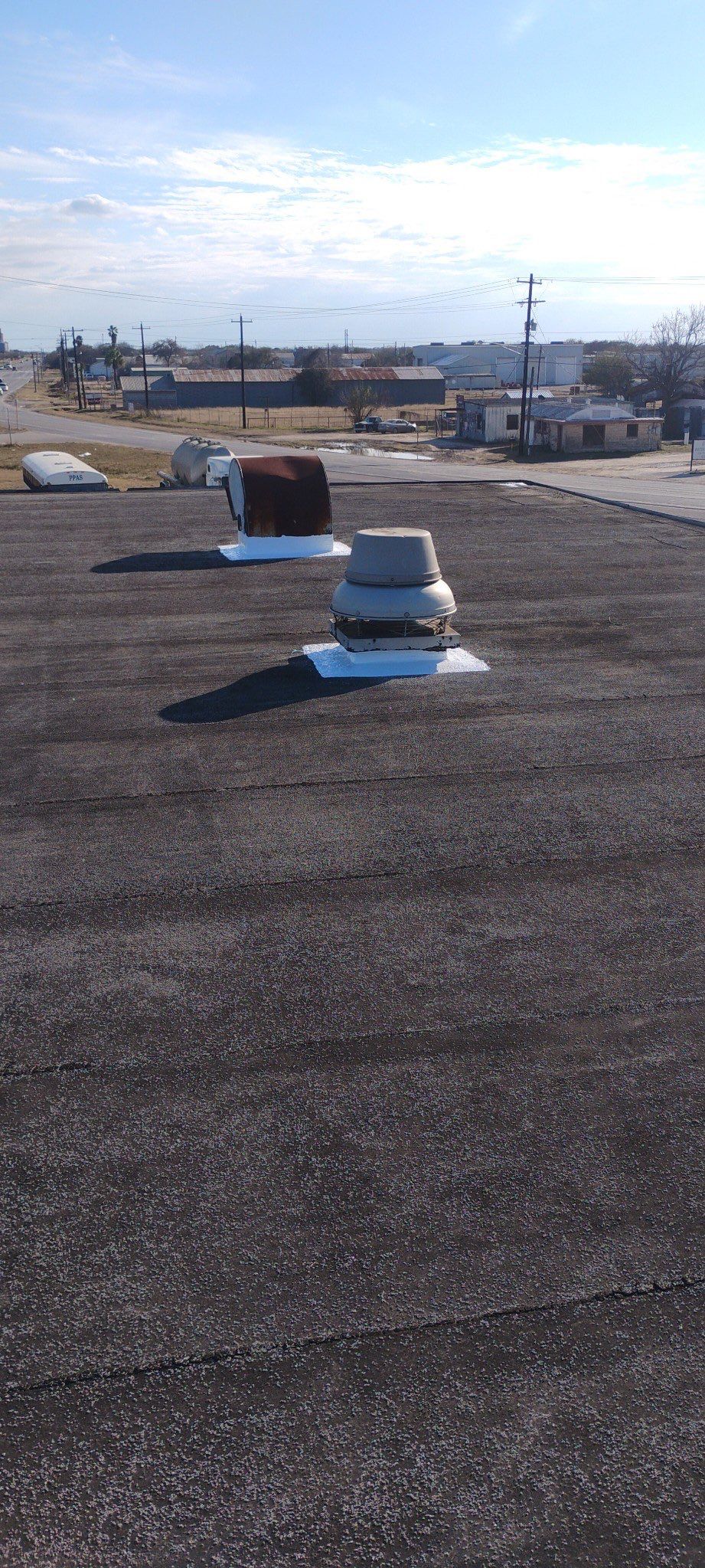 Commercial Silcone Roof Repair using Silcone Coating by Galvan Roofing and Construction
