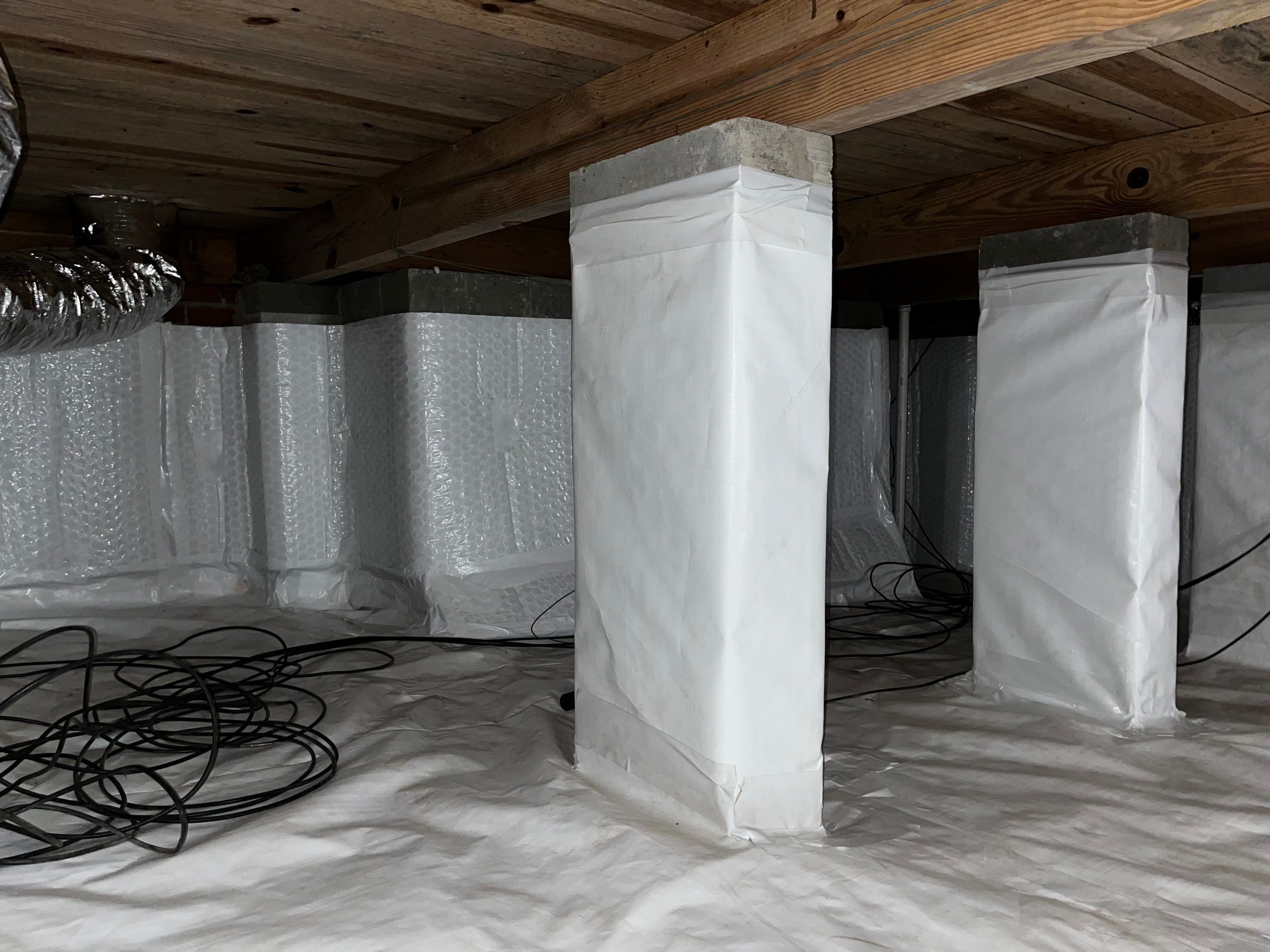 Impact Choice Encapsulation with new piers and crawlspace door. by Impact Crawlspace
