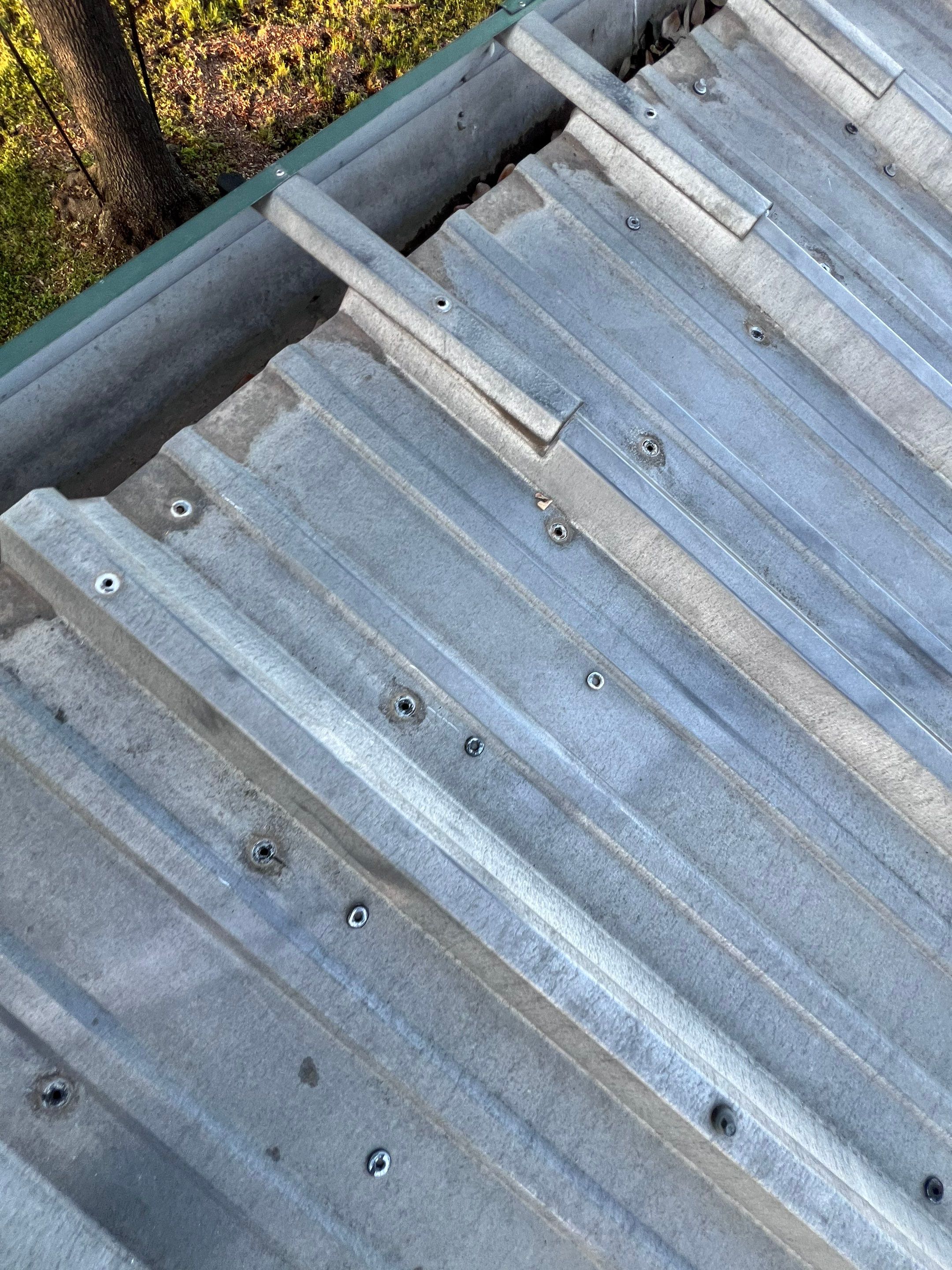 Hail Damage using Metal by Roof Repair Company
