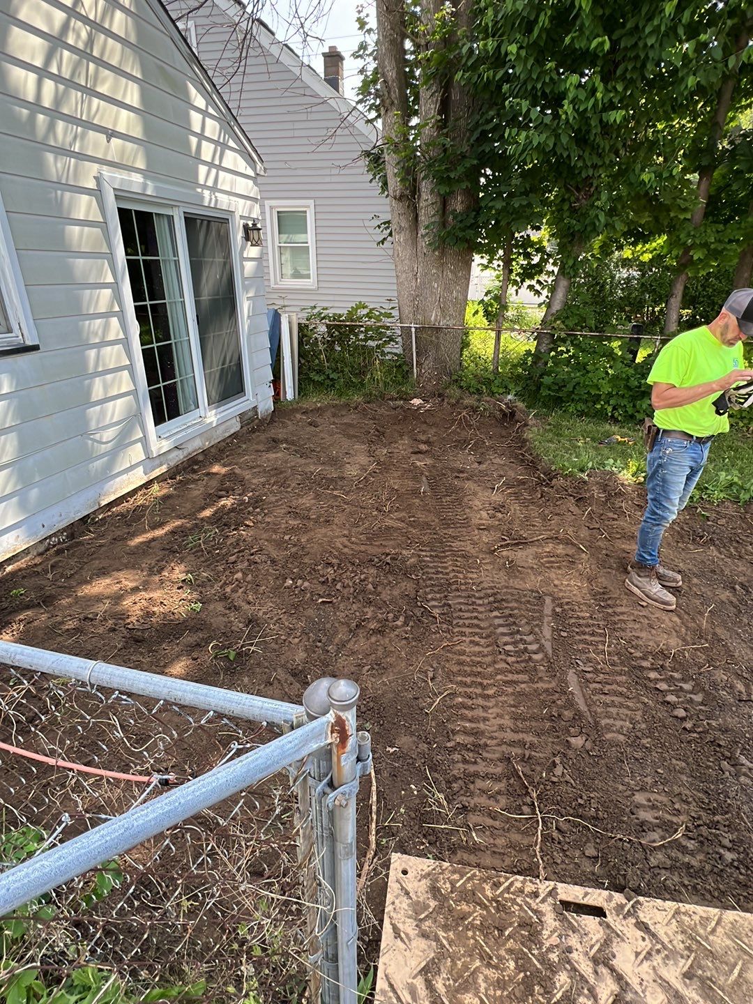Broom finished patio and garage floor replacement  by NG Masonry & Construction LLC