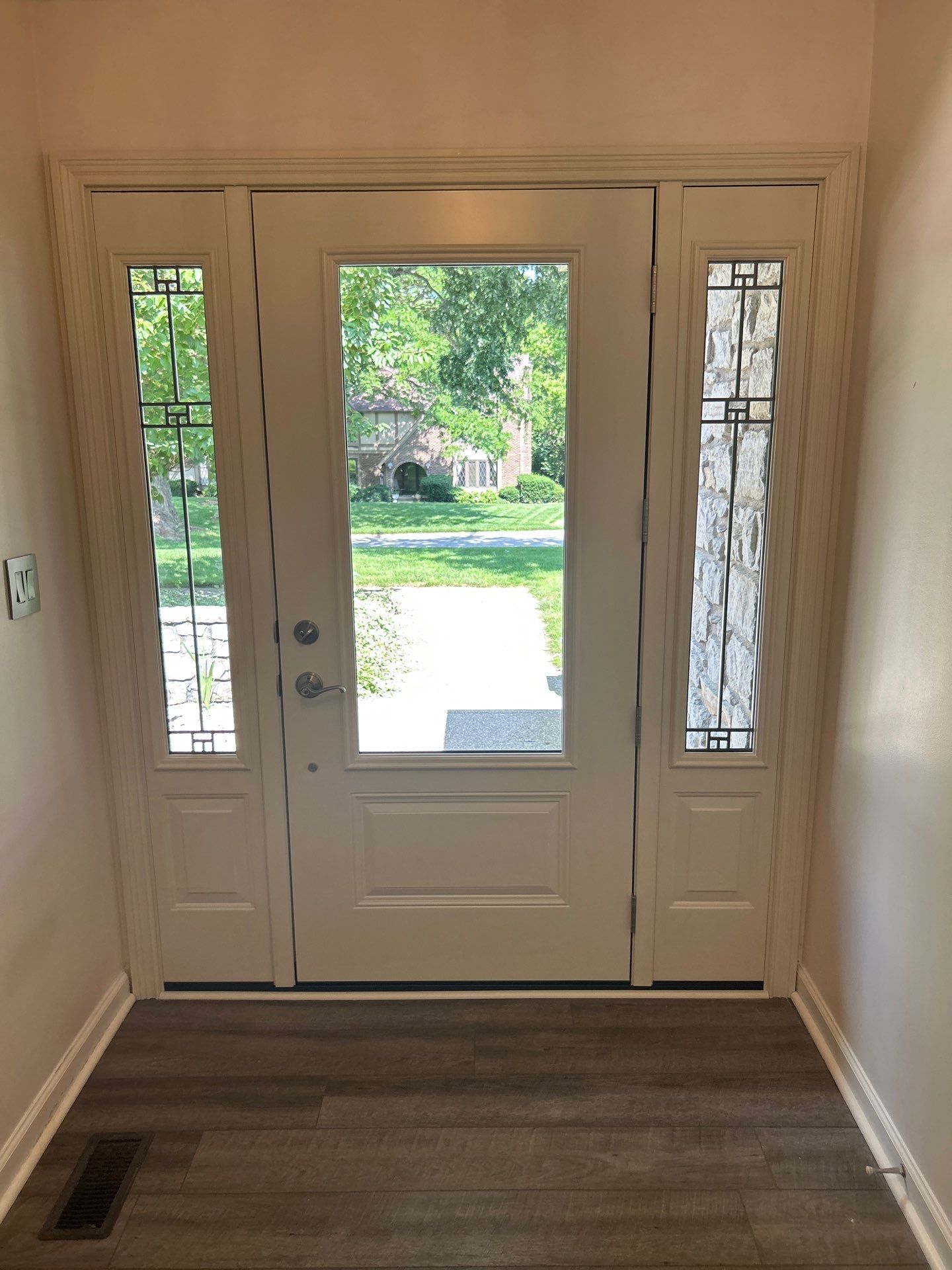 Custom Front Entry and Sliding Patio Door Replacement in Greenwood by Merrifield Exteriors, LLC