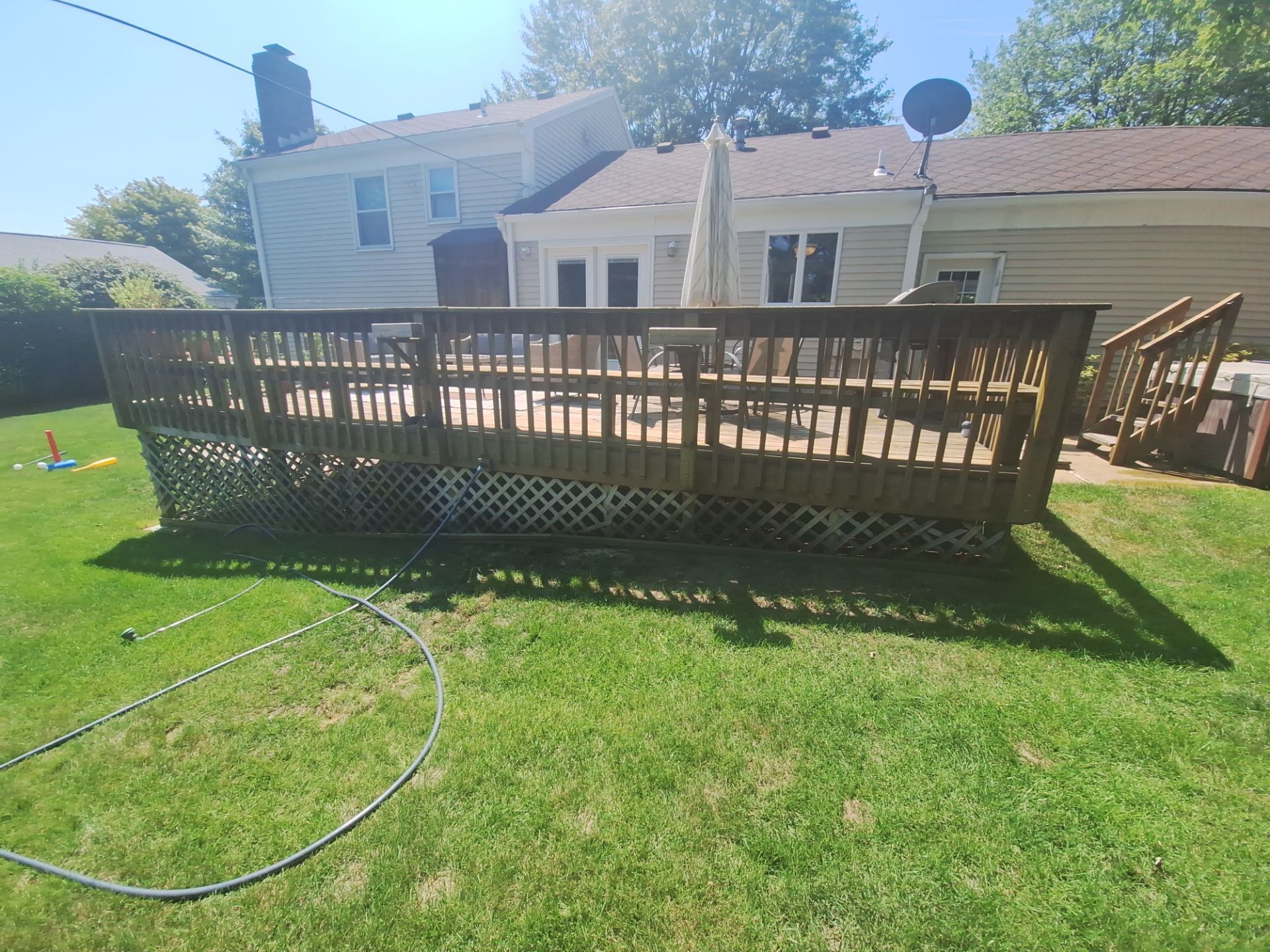 Deck Wash & Stain Transformation | Spring Lake, Michigan by Gordon Painting