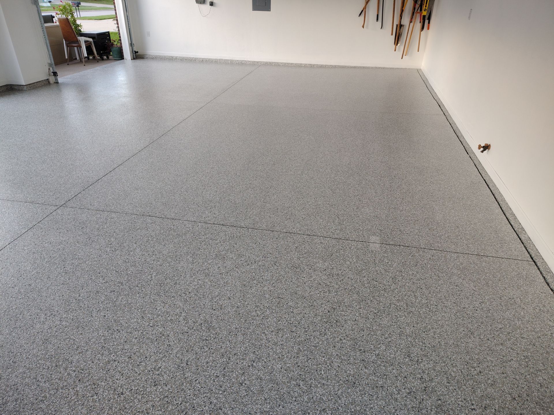 New Johnston Garage Resurfacing by Revival Concrete Coatings, LLC