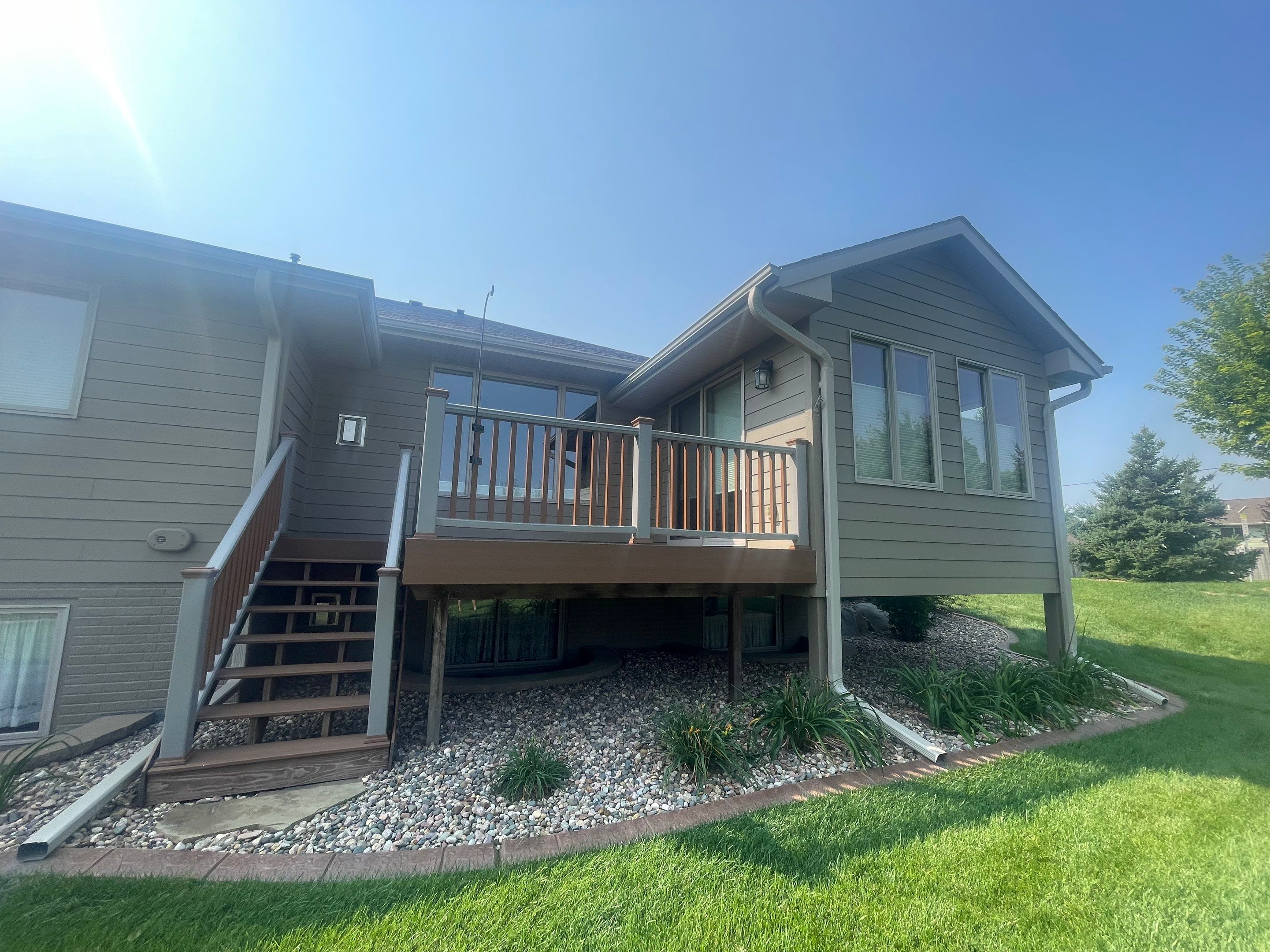 Residential Exterior Siding and Trim Painting in Sioux Falls by Select Painting, Coatings & Garage Cabinets