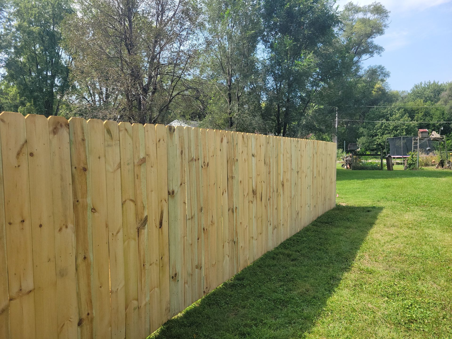Treated Pine Privacy and Picket Fence Installation in Evansdale by Perfect Picket Fence and Stain