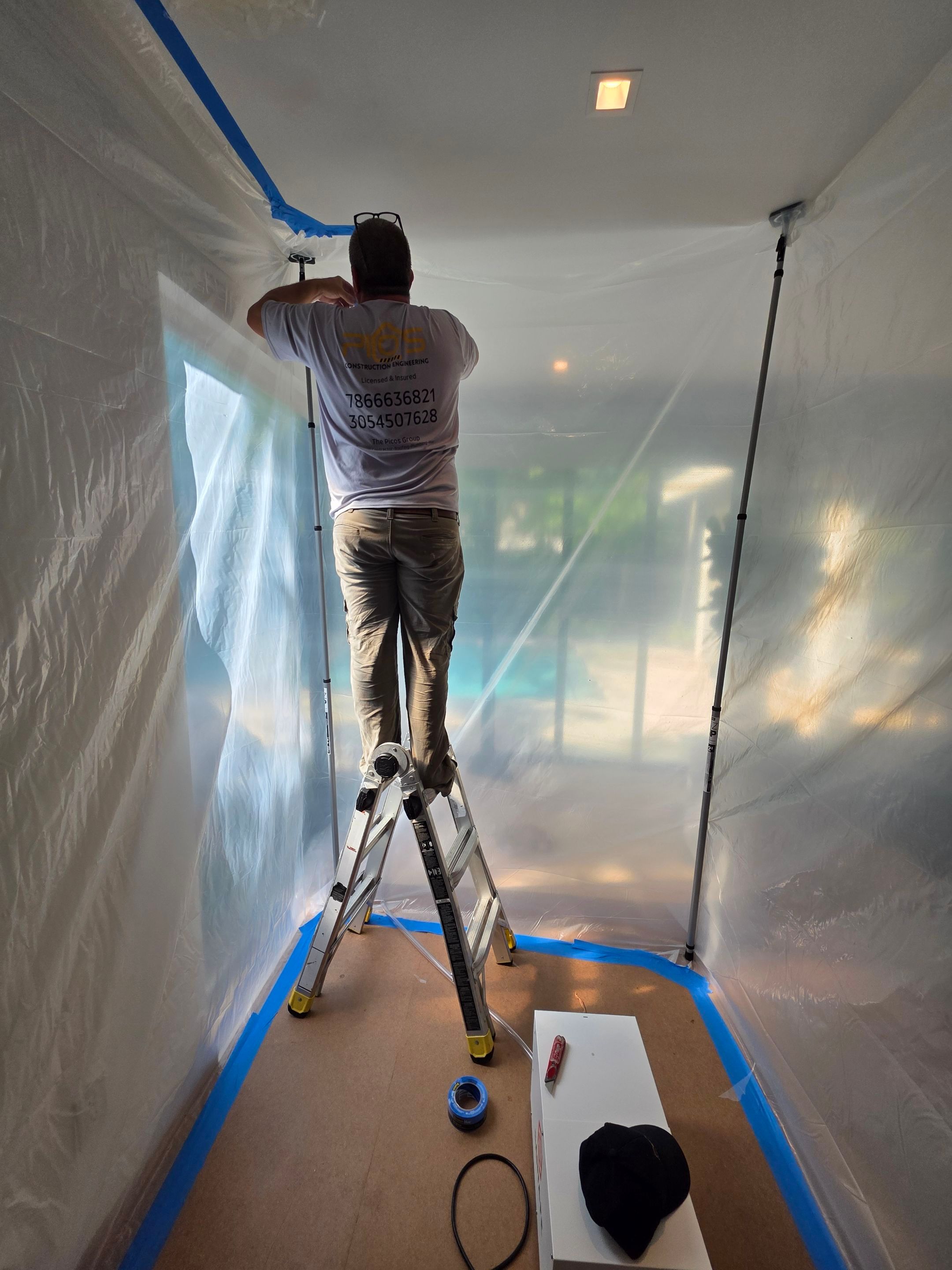 Flat Roof Silicone Coating and Interior Water Damage Restoration in Miami by Picos Construction Engineering