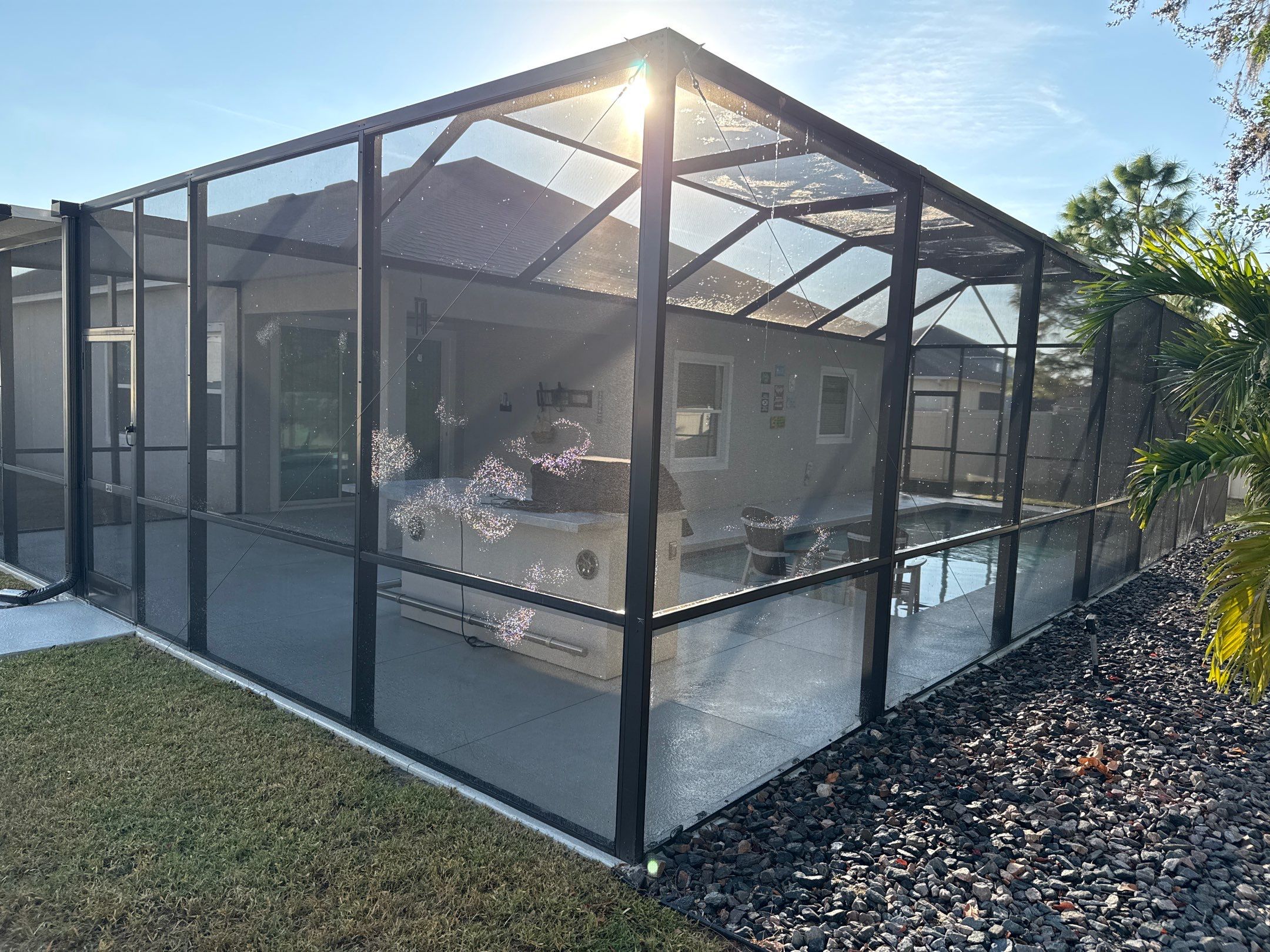 Painted Pool Deck & Screen Enclosure Cleaning | Heron Creek, Palmetto FL by Sunshine AquaWash