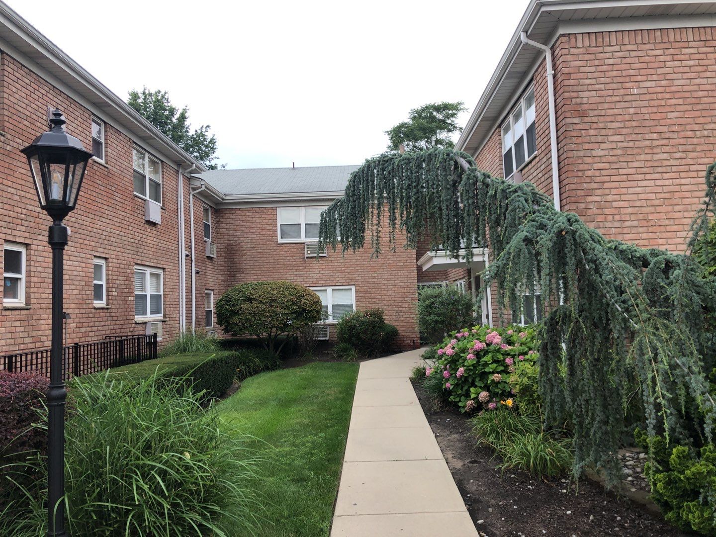 Multi-Unit Apartment Complex Exterior Brick Painting Project in Hackensack by Spectrum Painting, LLC