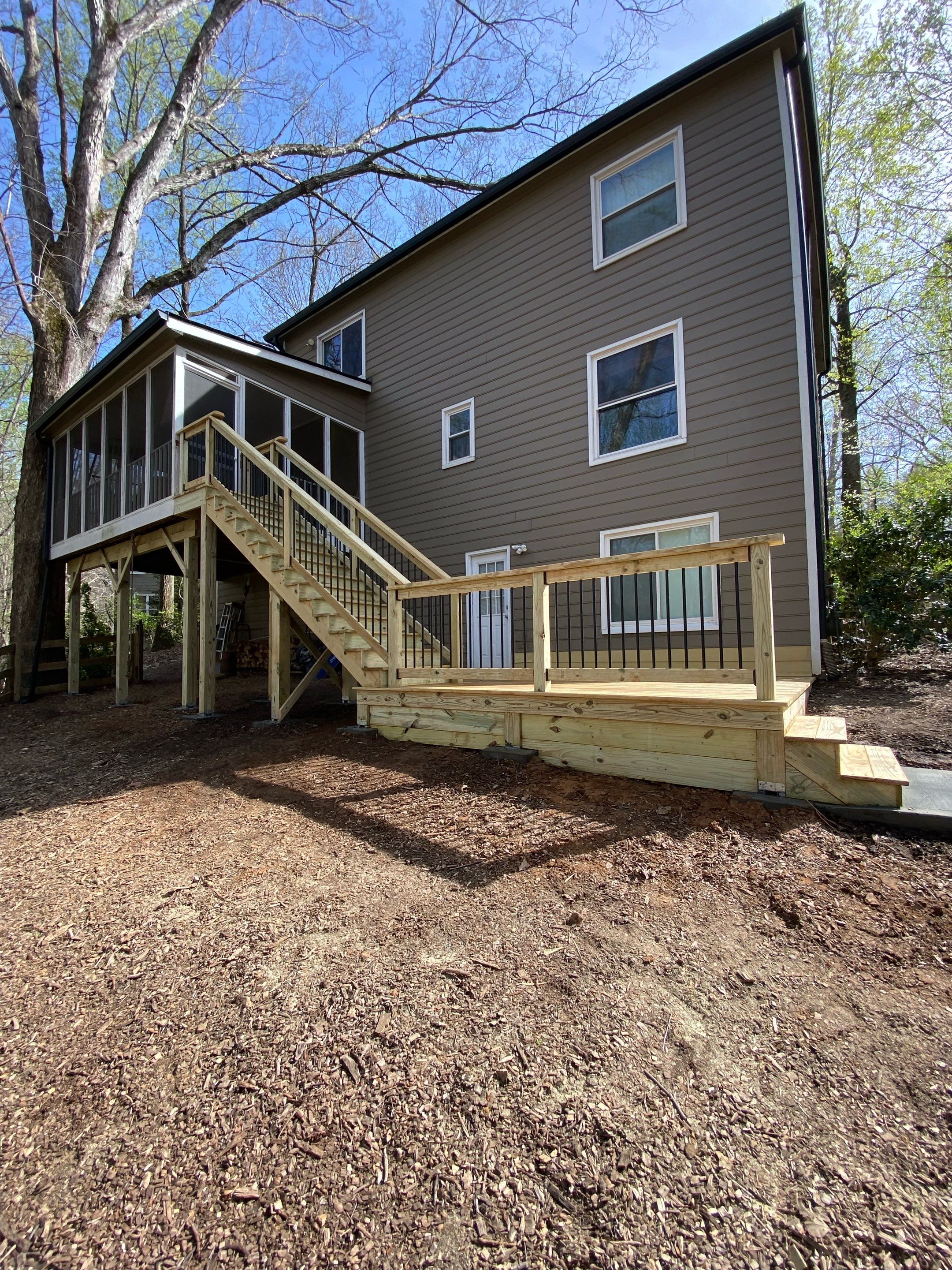 Pressure-Treated Wood Deck and Staircase Installation in Kennesaw by Swift Home Renovations