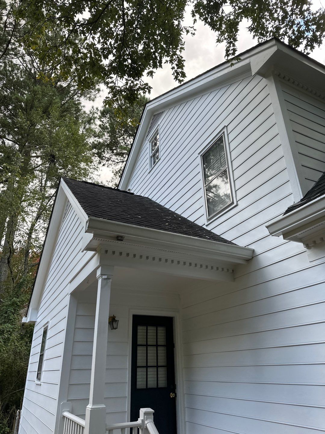 James Hardie Siding Replacement and Custom Deck Construction in Cary by The Remodeling Company