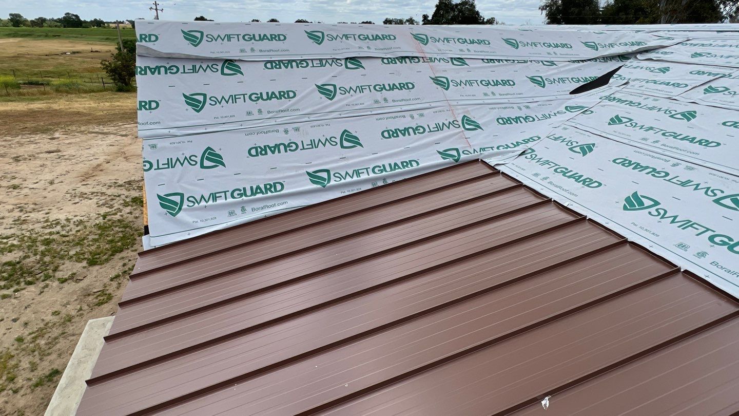 Metal roofing installation using Standing seam metal roofing system by Straight Edge Roofing Inc