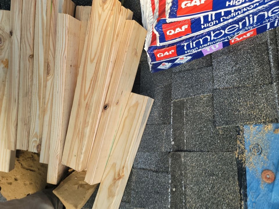 Residential Roofing Installation using Roof Replacement by American Roofing & Construction LLC