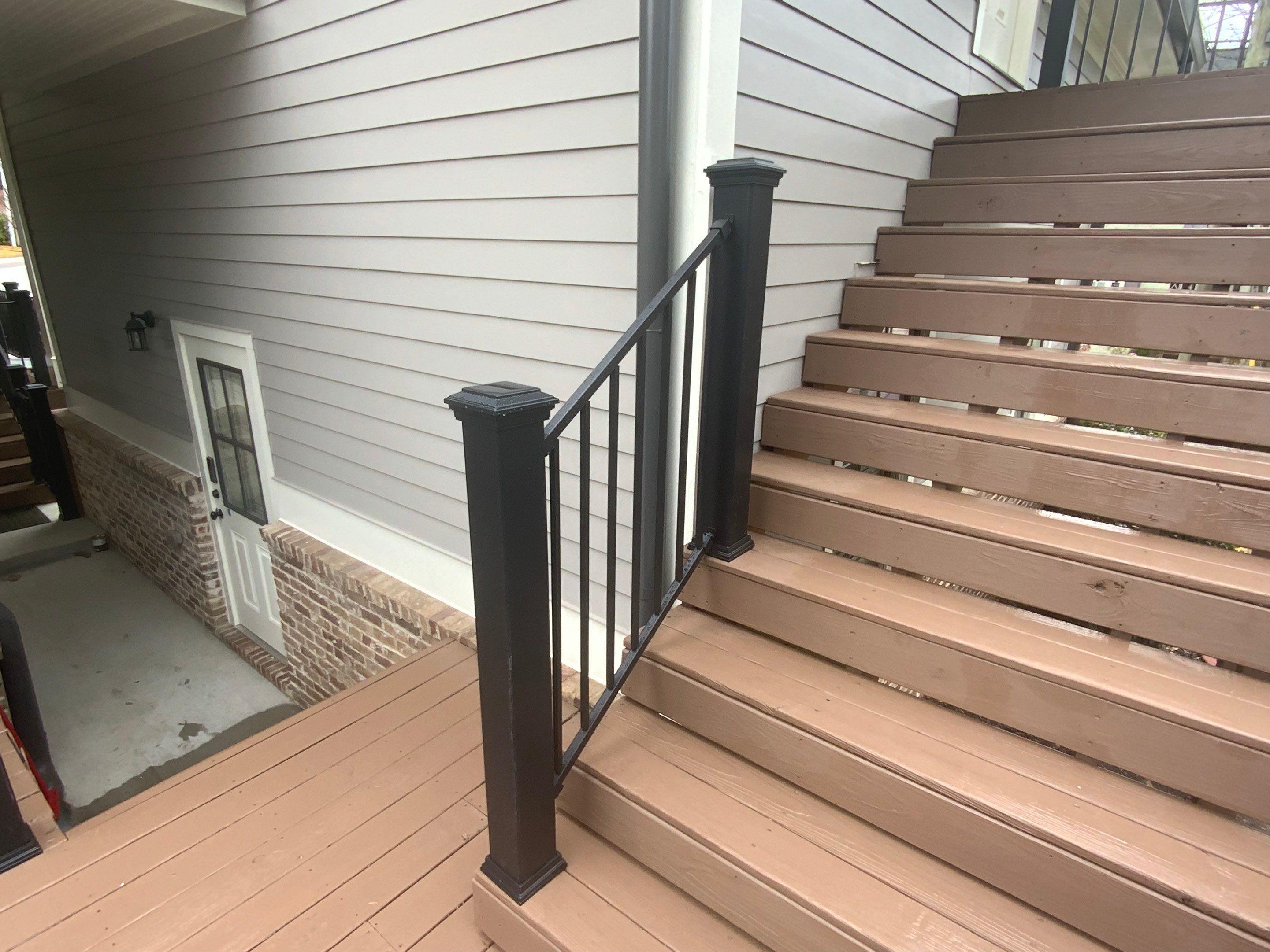 Modern Black Metal Railing and Composite Deck Upgrade in Norcross by Swift Home Renovations